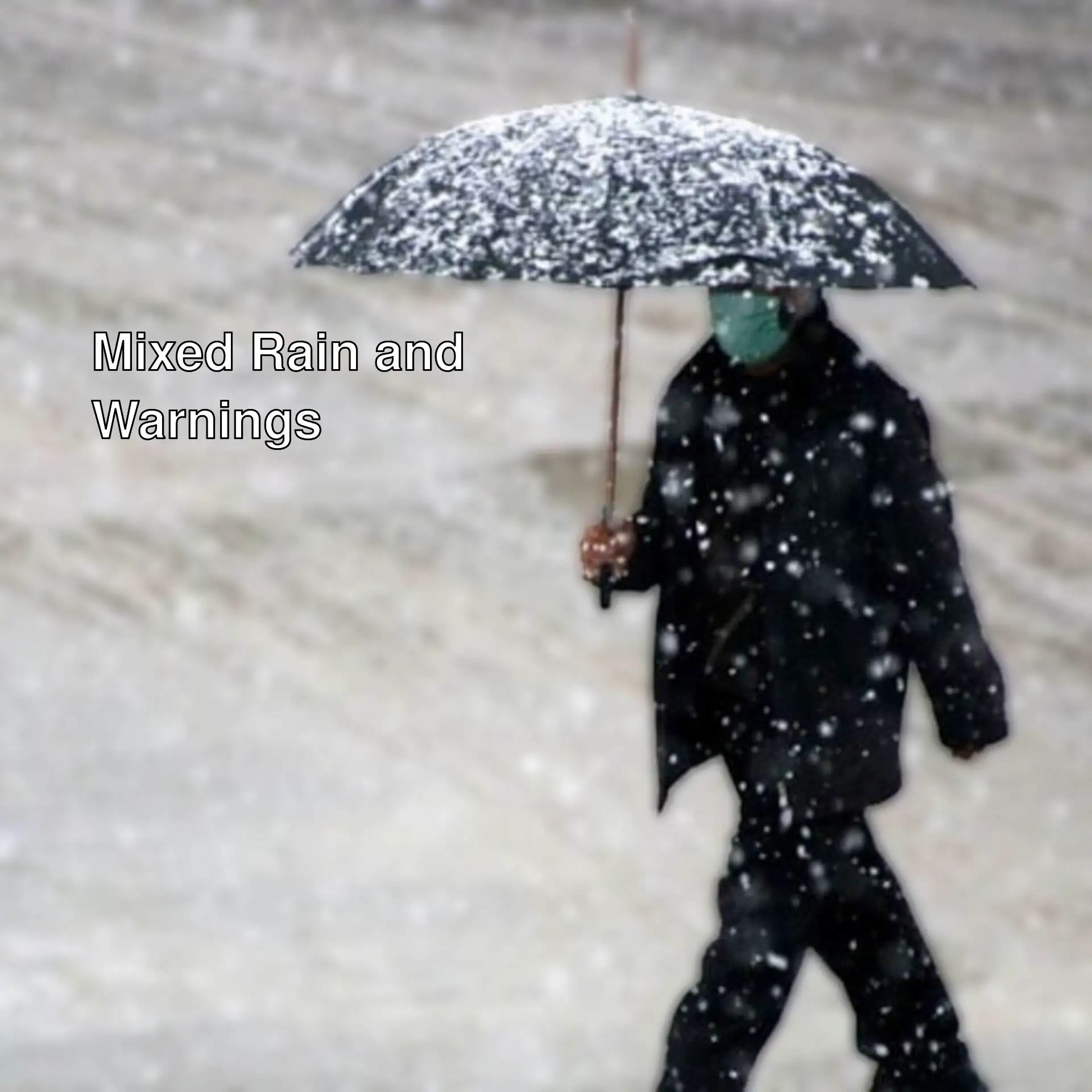 A person holding an umbrella in mixed rain. A person holding an umbrella in mixed rain.