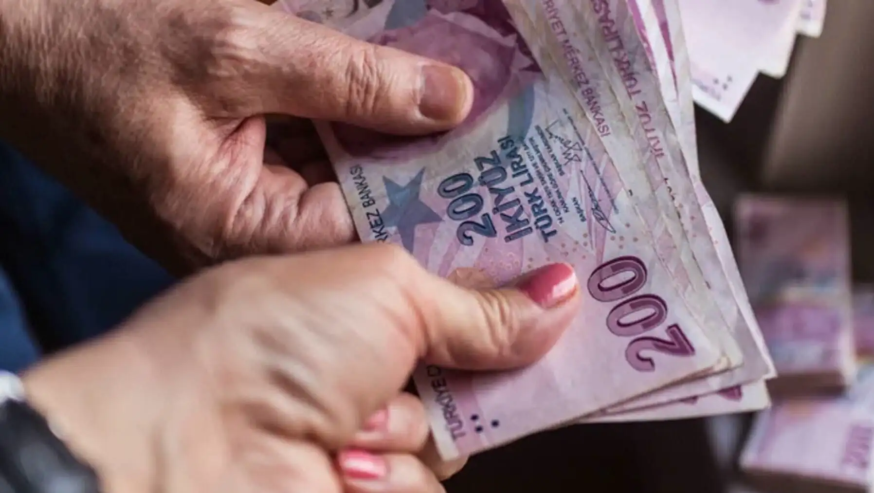 A person holding money.