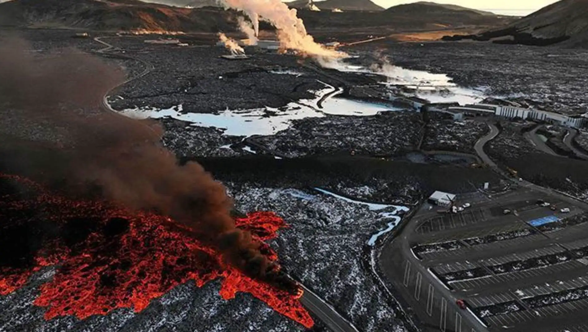 A large volcano erupting with smoke coming out of it. A large volcano erupting with smoke coming out of it.