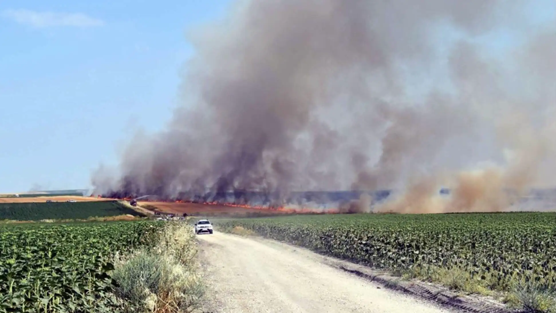 A vehicle in an area with smoke coming out. A vehicle in an area with smoke coming out.