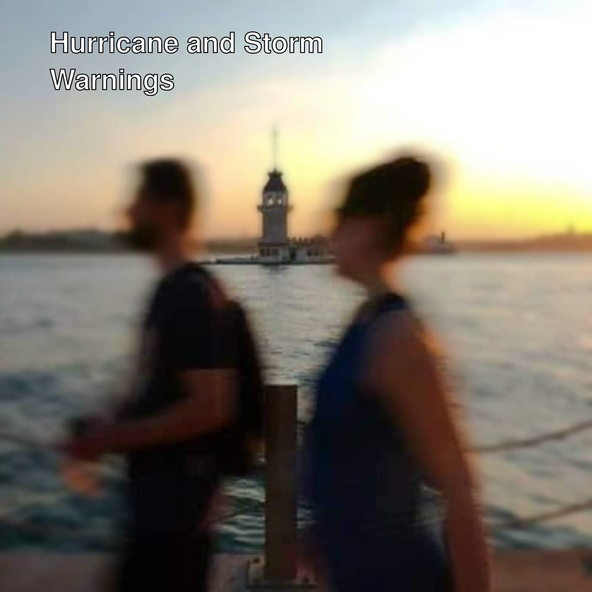 A man and woman standing on a dock. A man and woman standing on a dock.