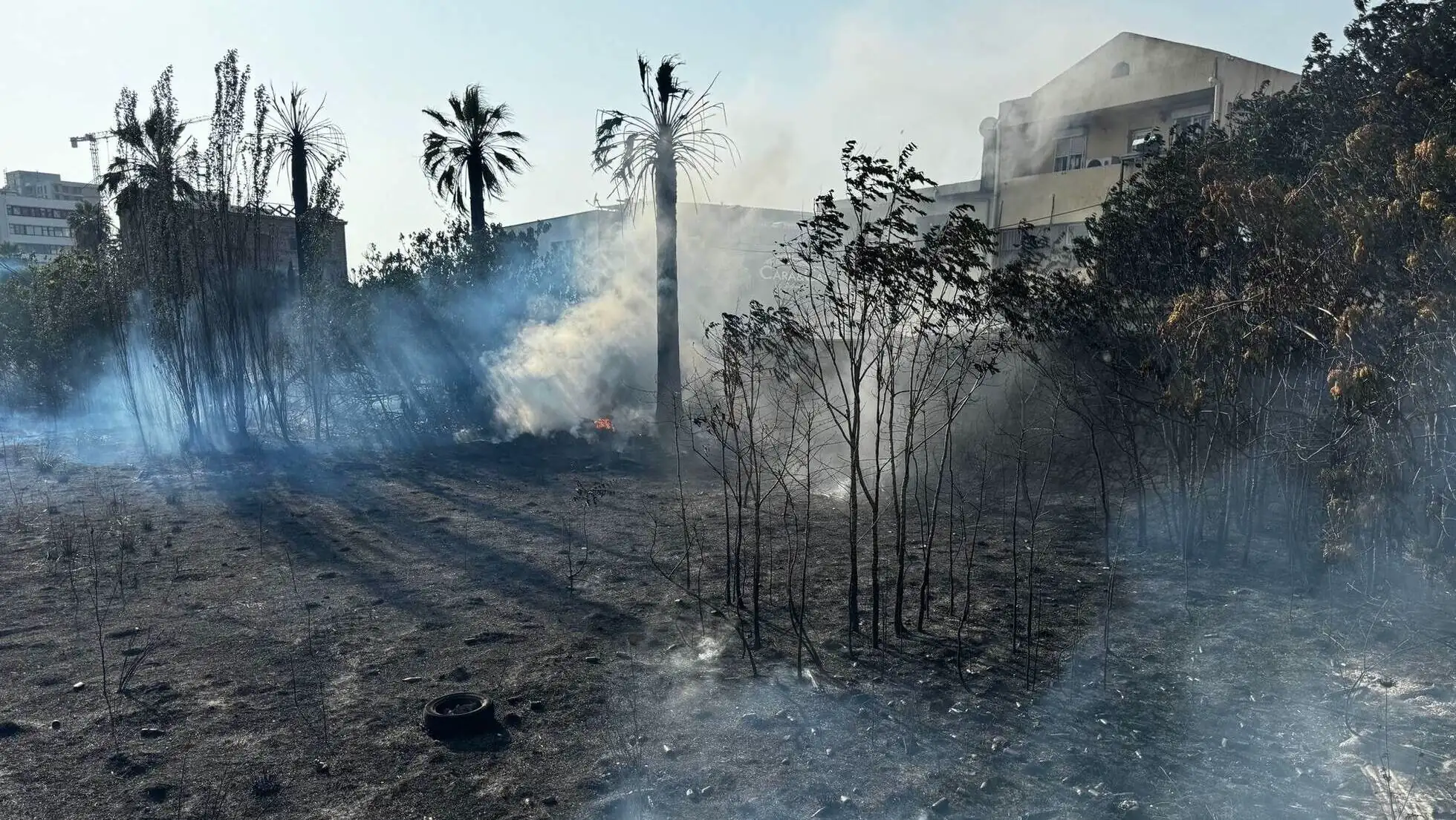 Firefighters are working in a fire area. Firefighters are working in a fire area.