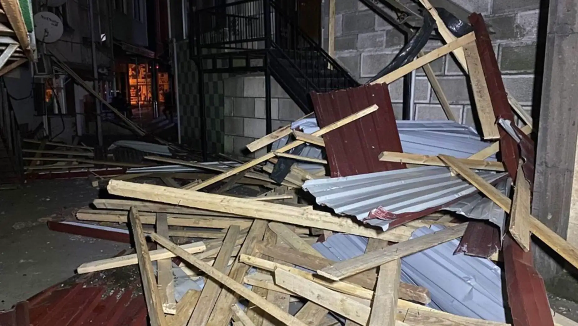 A pile of wood and metal. After the storm. A pile of wood and metal. After the storm.