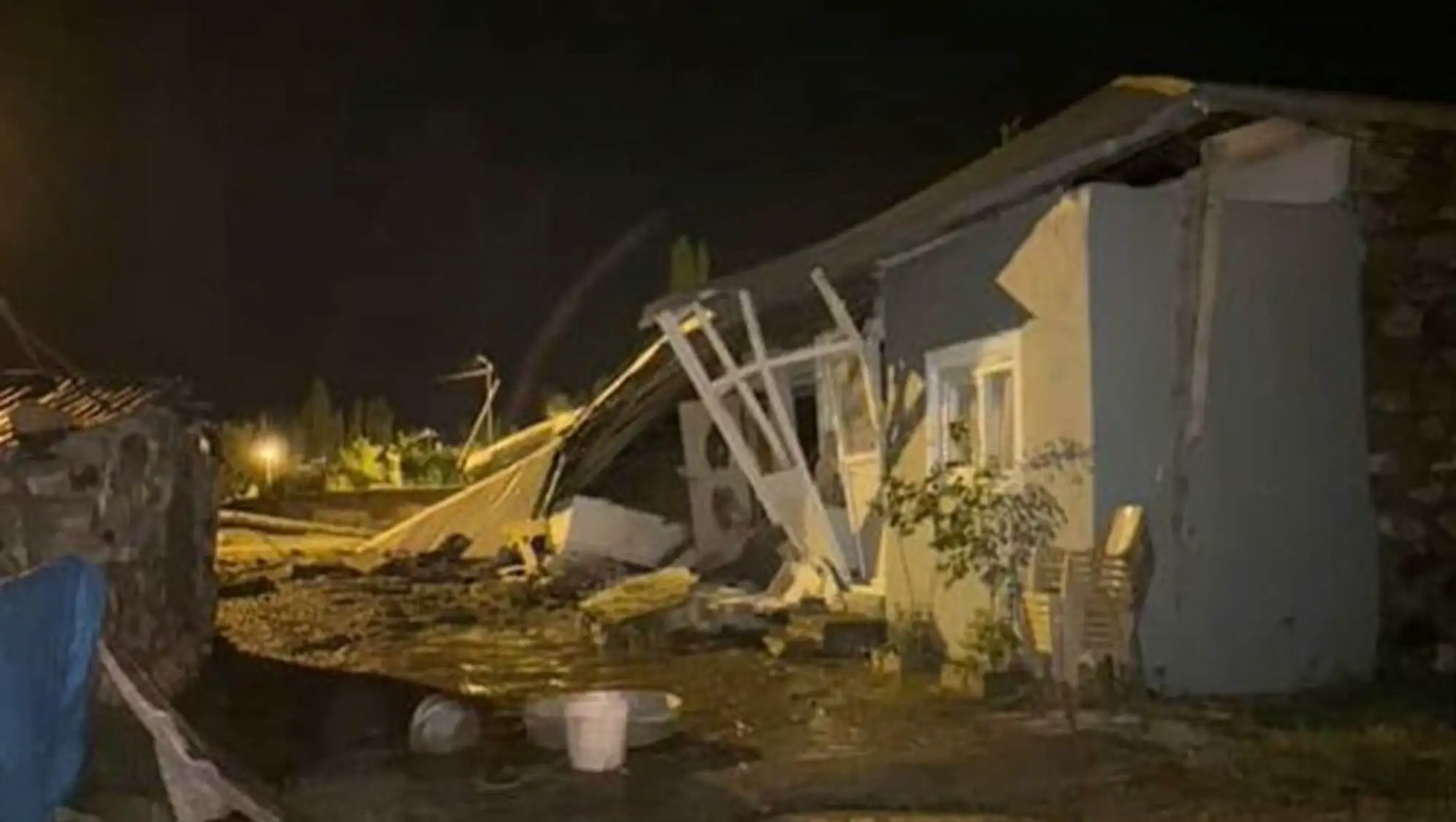 A house damaged by the flood. A house damaged by the flood.