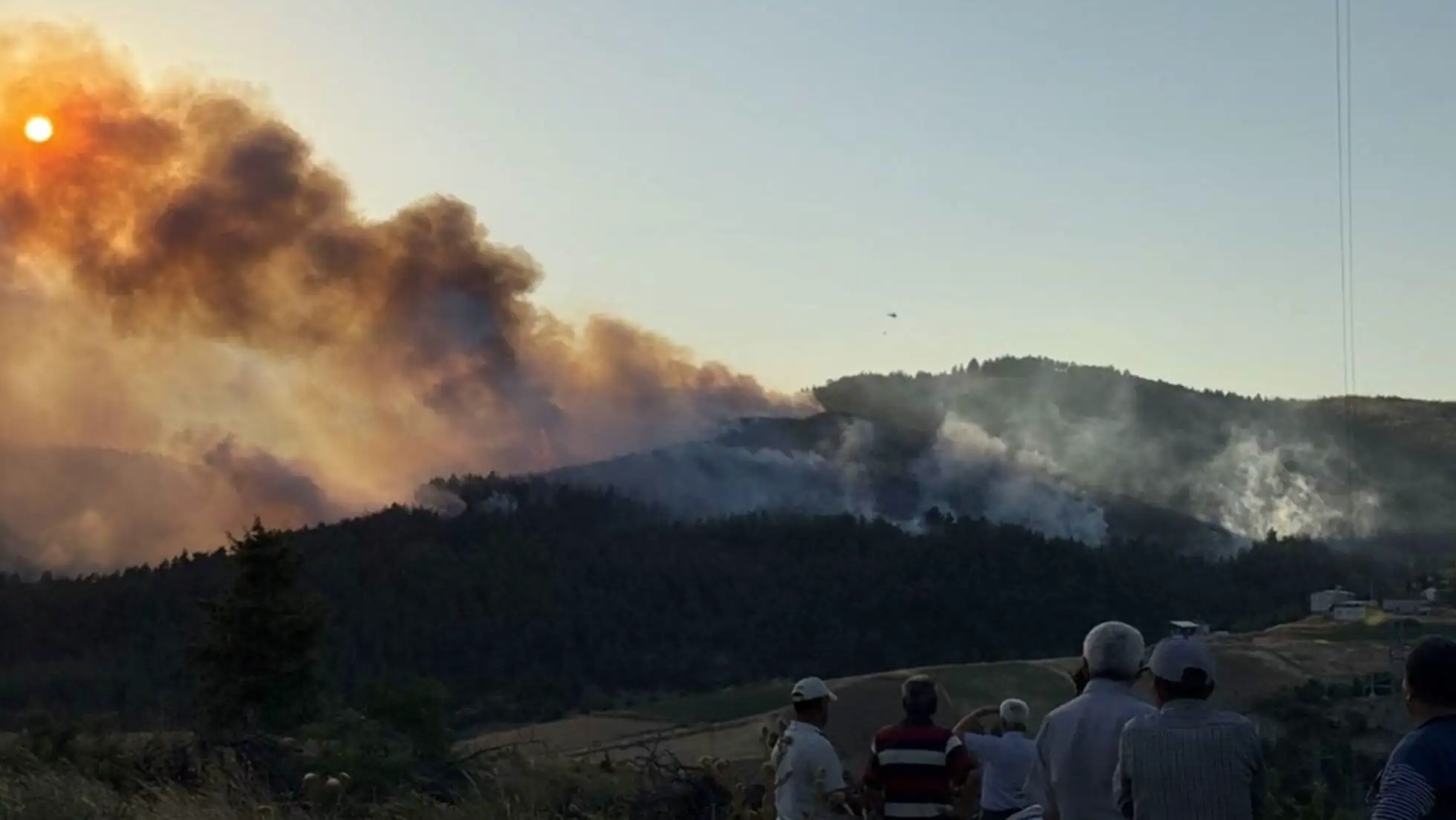 A group of people watching a forest fire in Bursa. A group of people watching a forest fire in Bursa.