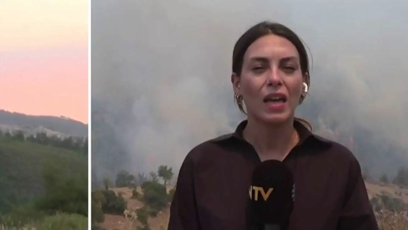 A view of flames rising in the fire area. A view of flames rising in the fire area.