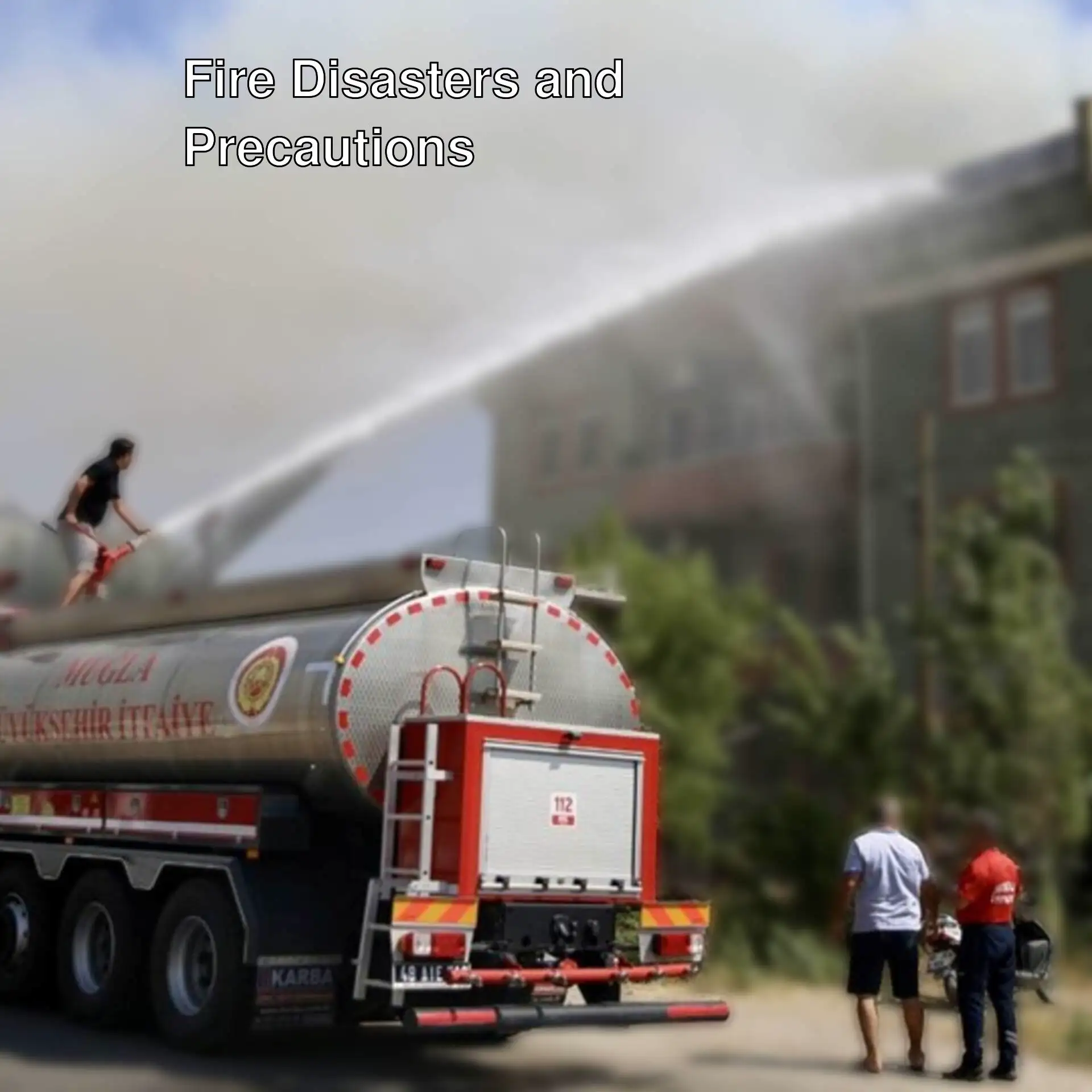A fire truck spraying water on a building.