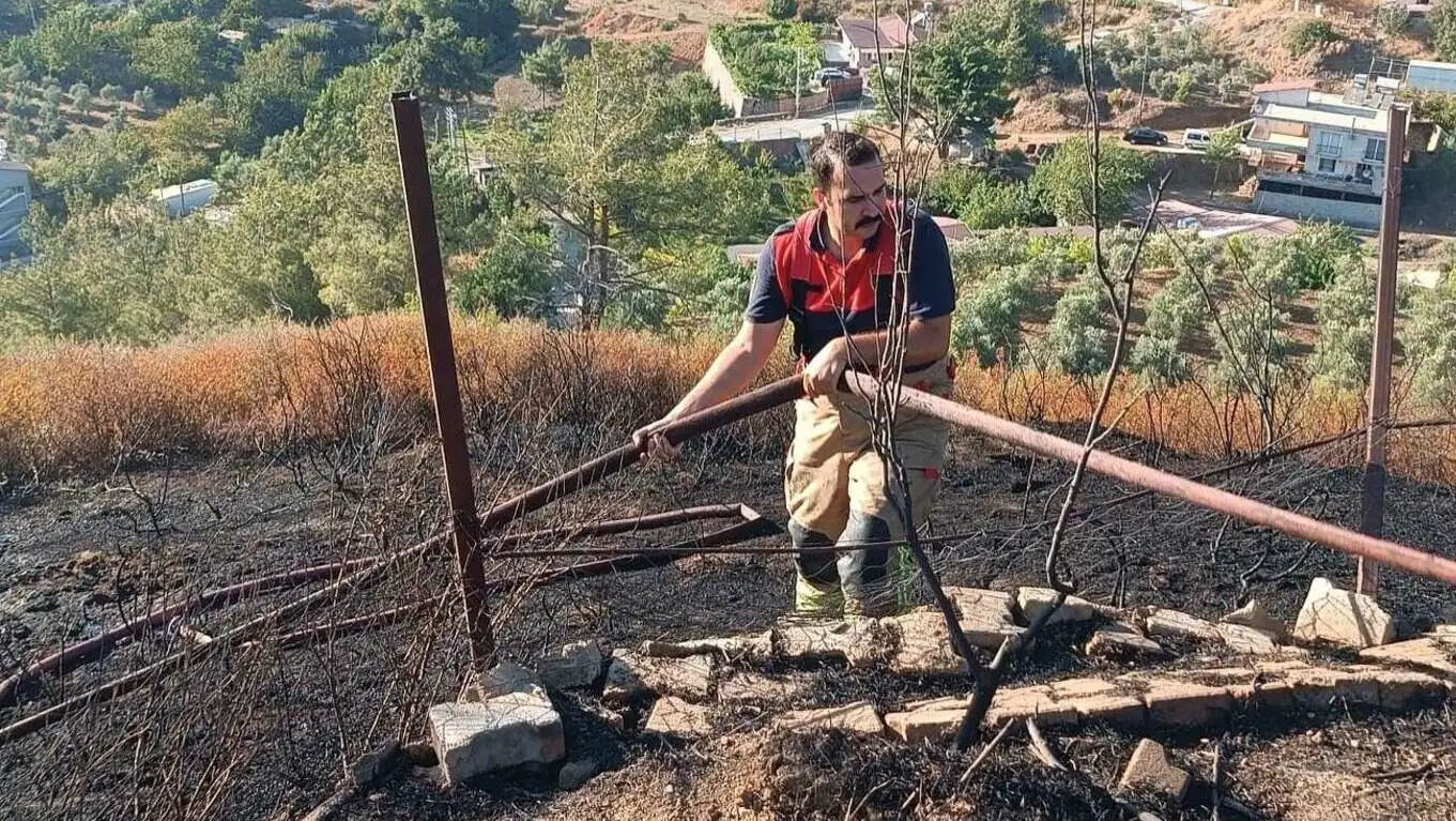 A man during the forest fire in Hatay. A man during the forest fire in Hatay.