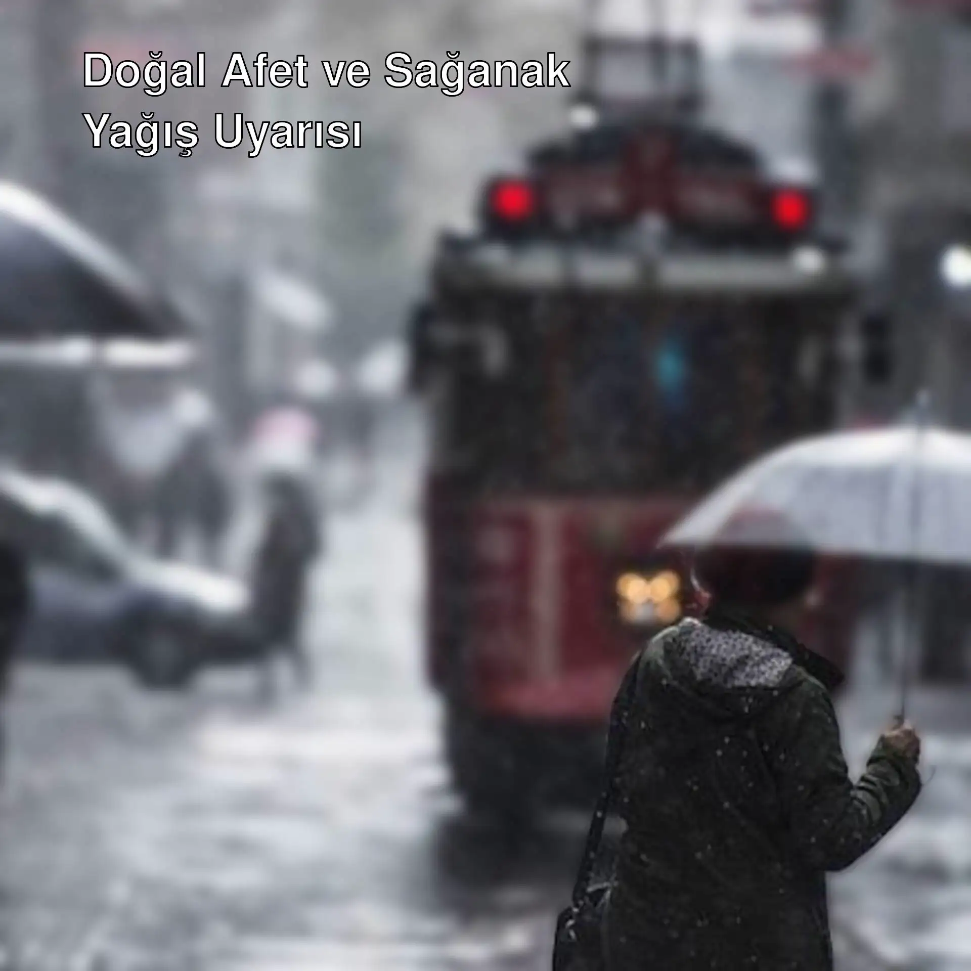 Yağmurda şemsiye tutan bir kişi. Yağmurda şemsiye tutan bir kişi.