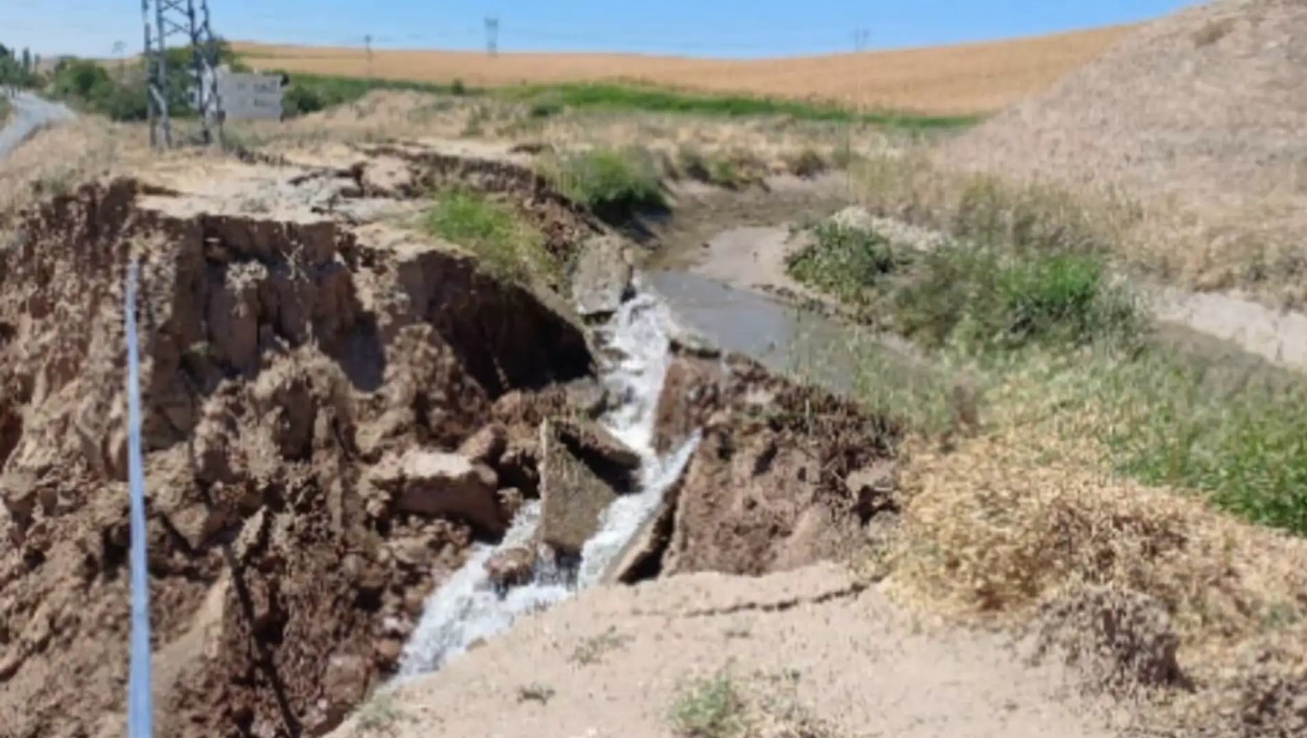 A stream running through a dirt area. A stream running through a dirt area.