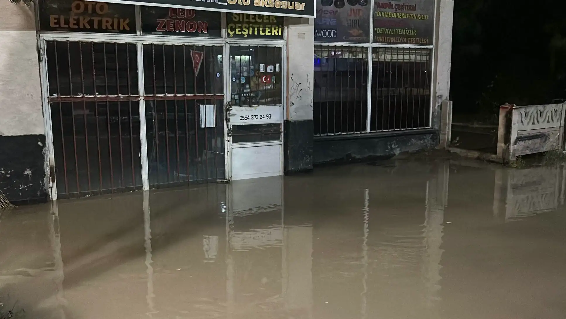 A flooded building with water inside. A flooded building with water inside.