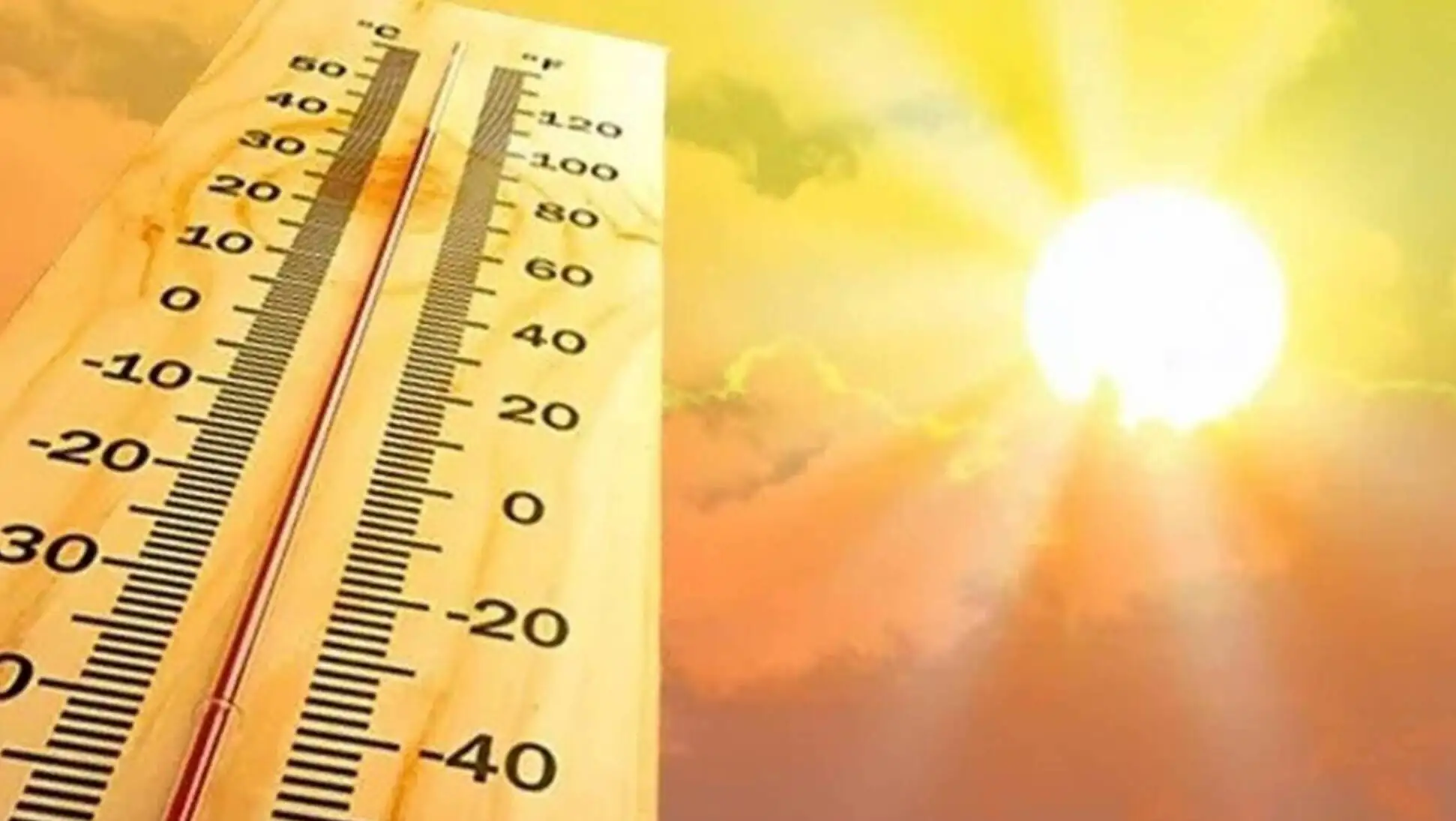 A thermometer with the sun in the background. A thermometer with the sun in the background.