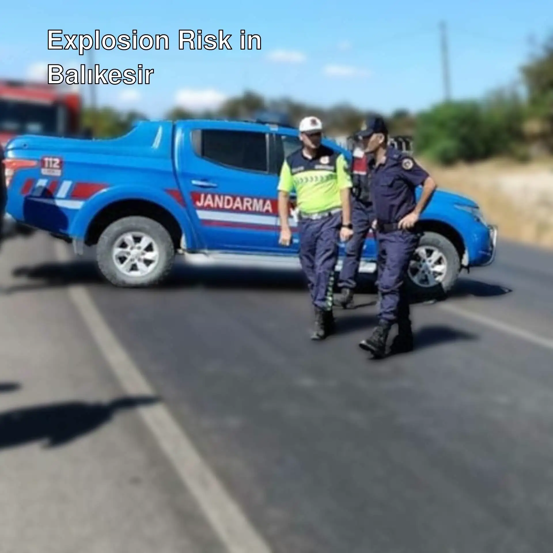 Police officers walking on the road while safety measures are taken in Balıkesir.