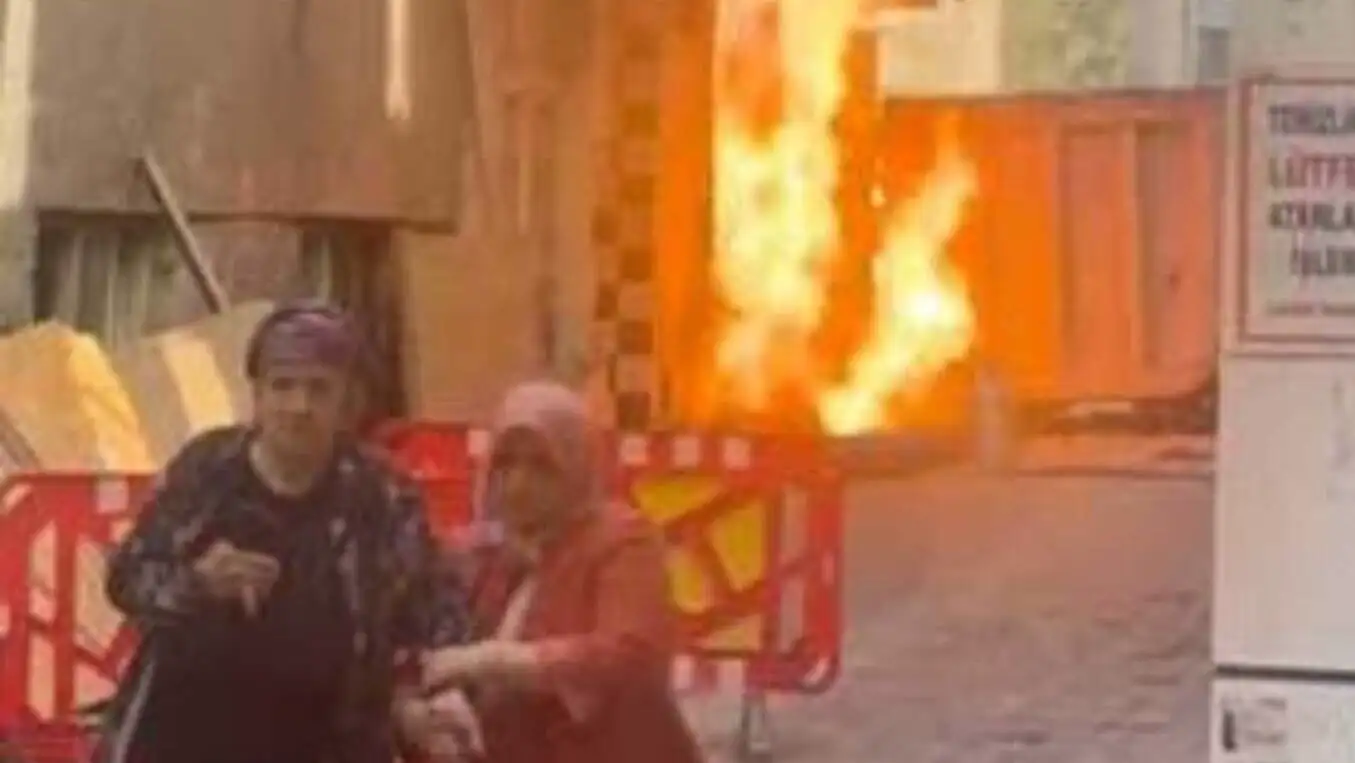 People gathered at the fire scene.