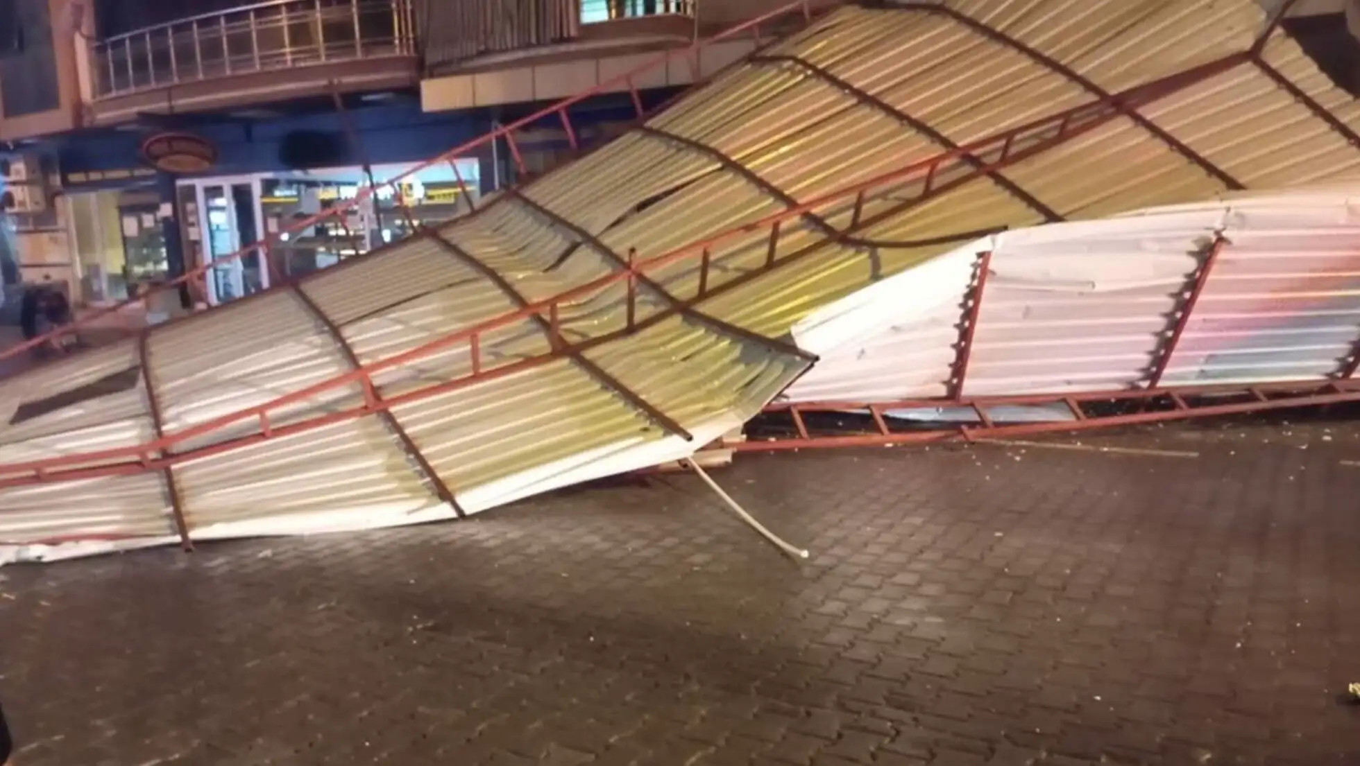 A large metal structure on the ground.