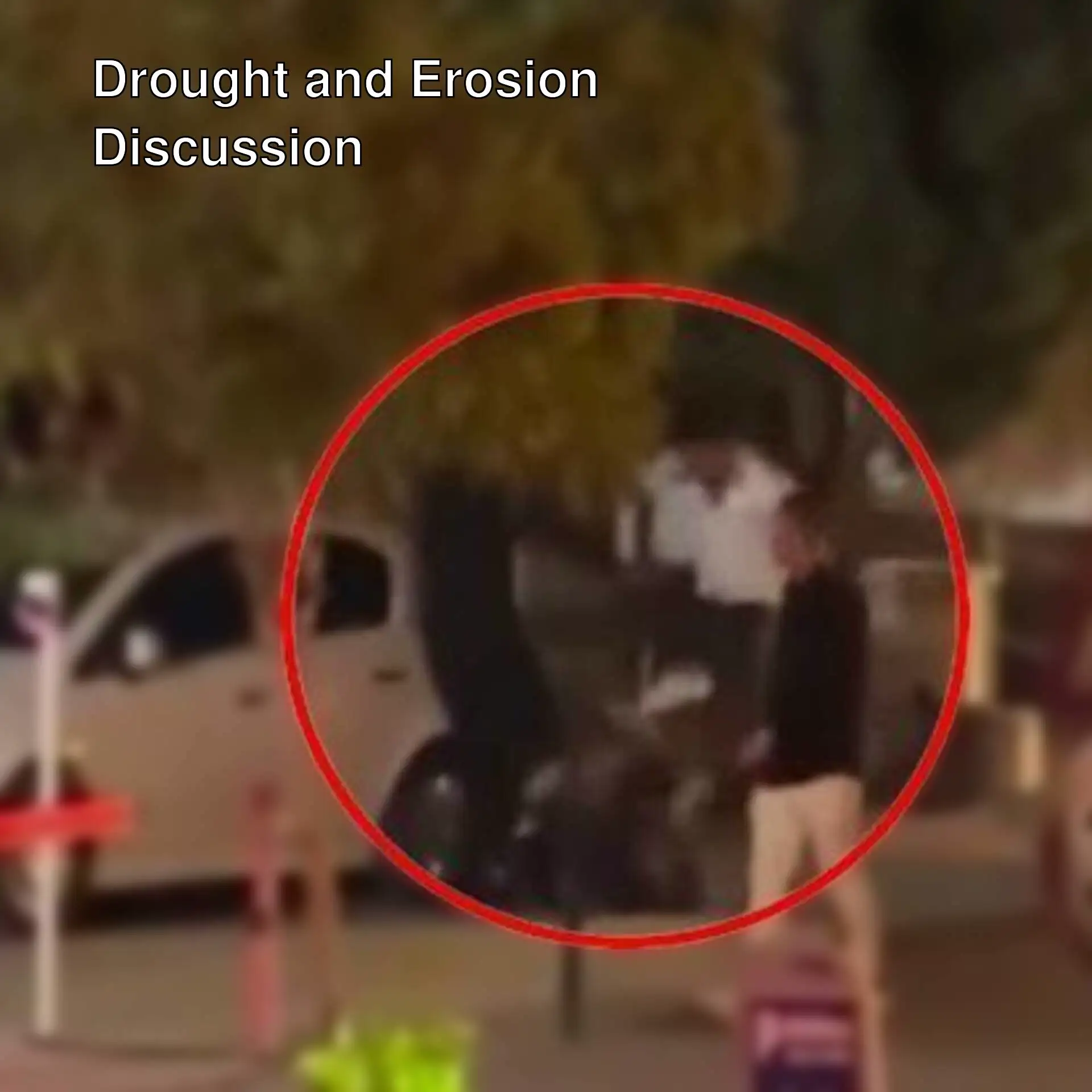 A man standing next to a white car in Bursa.