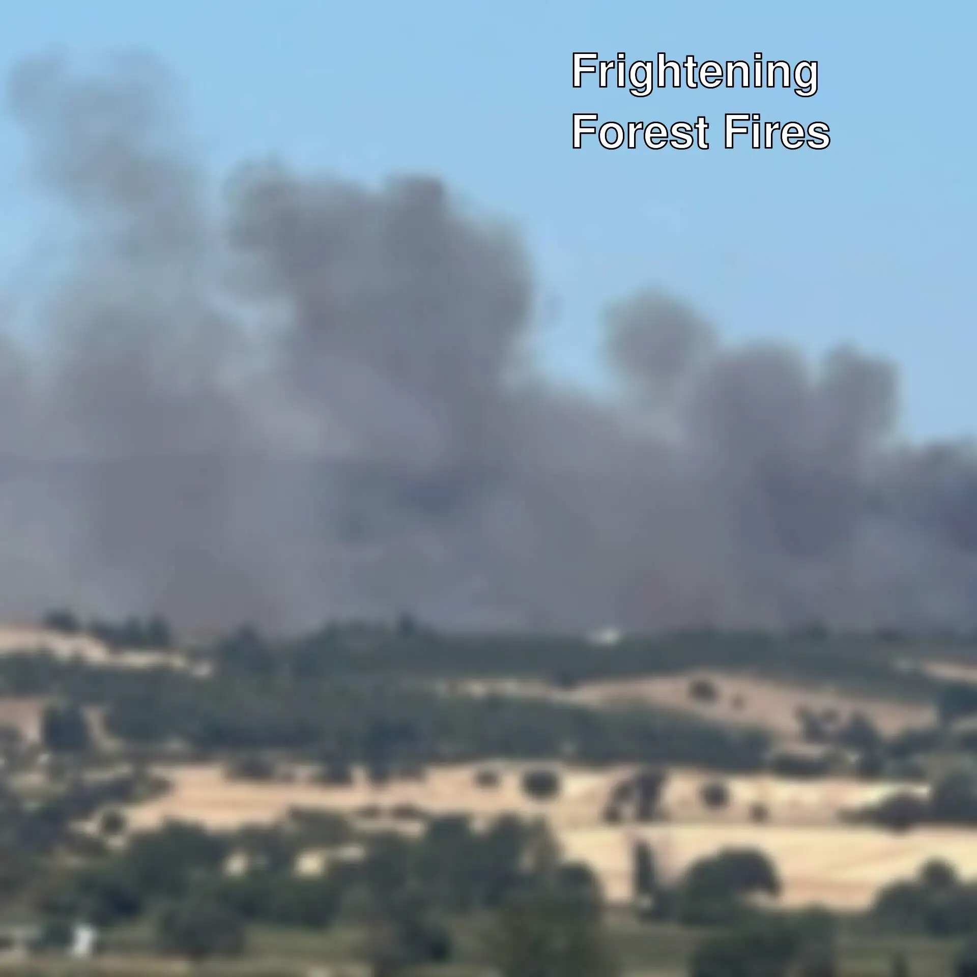 A large smoke billowing from a fire