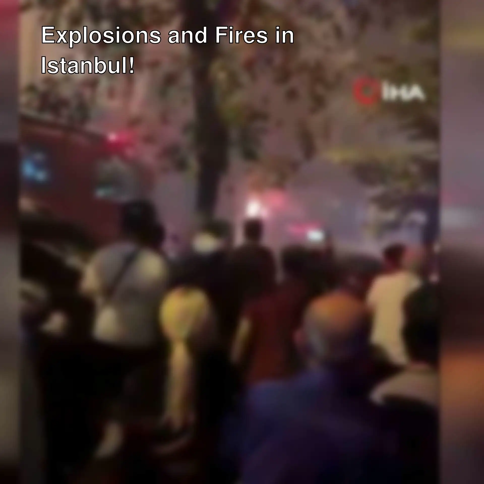 A group of people gathered on the street after the explosion in Bahçelievler, Istanbul.