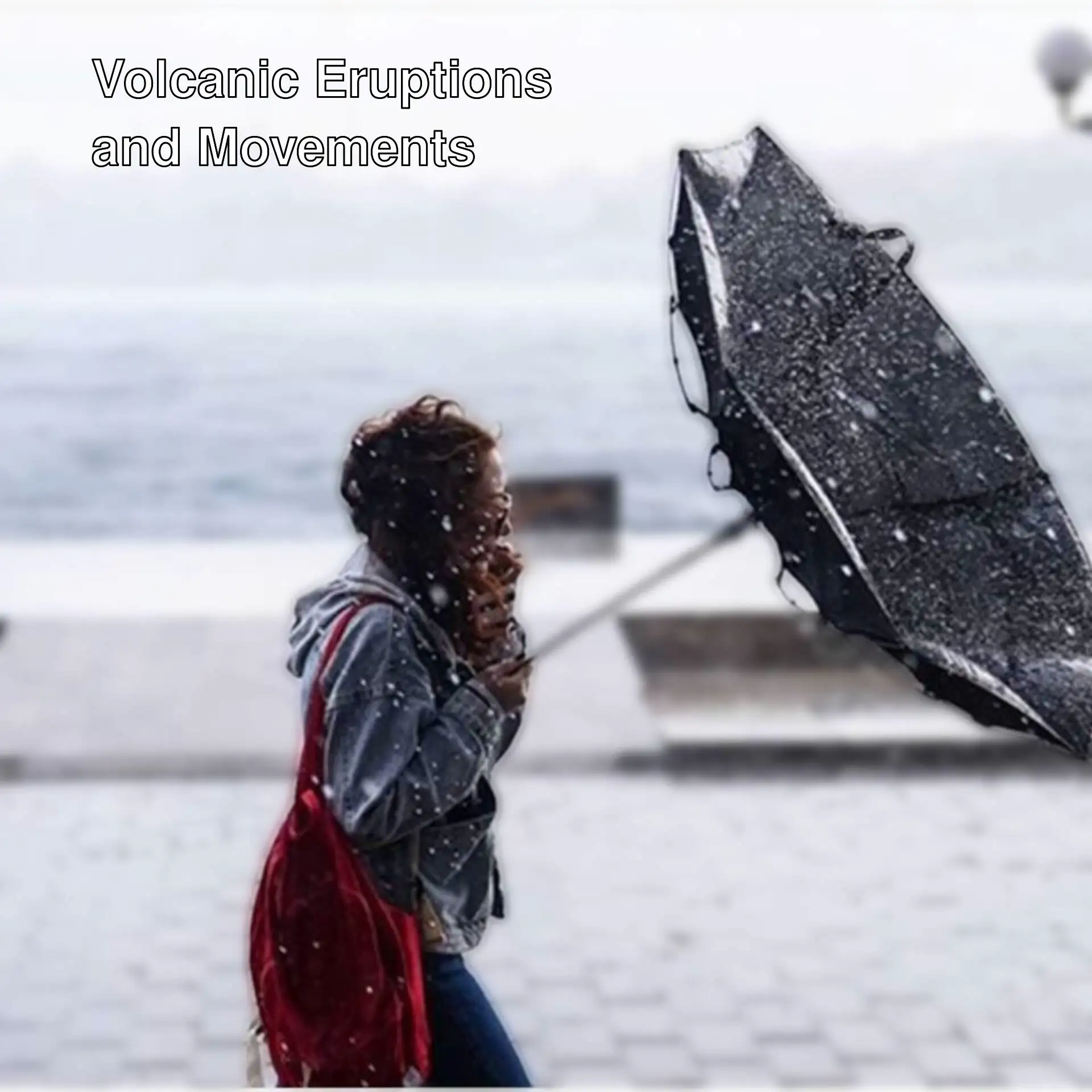 A woman holding an umbrella in the rain.