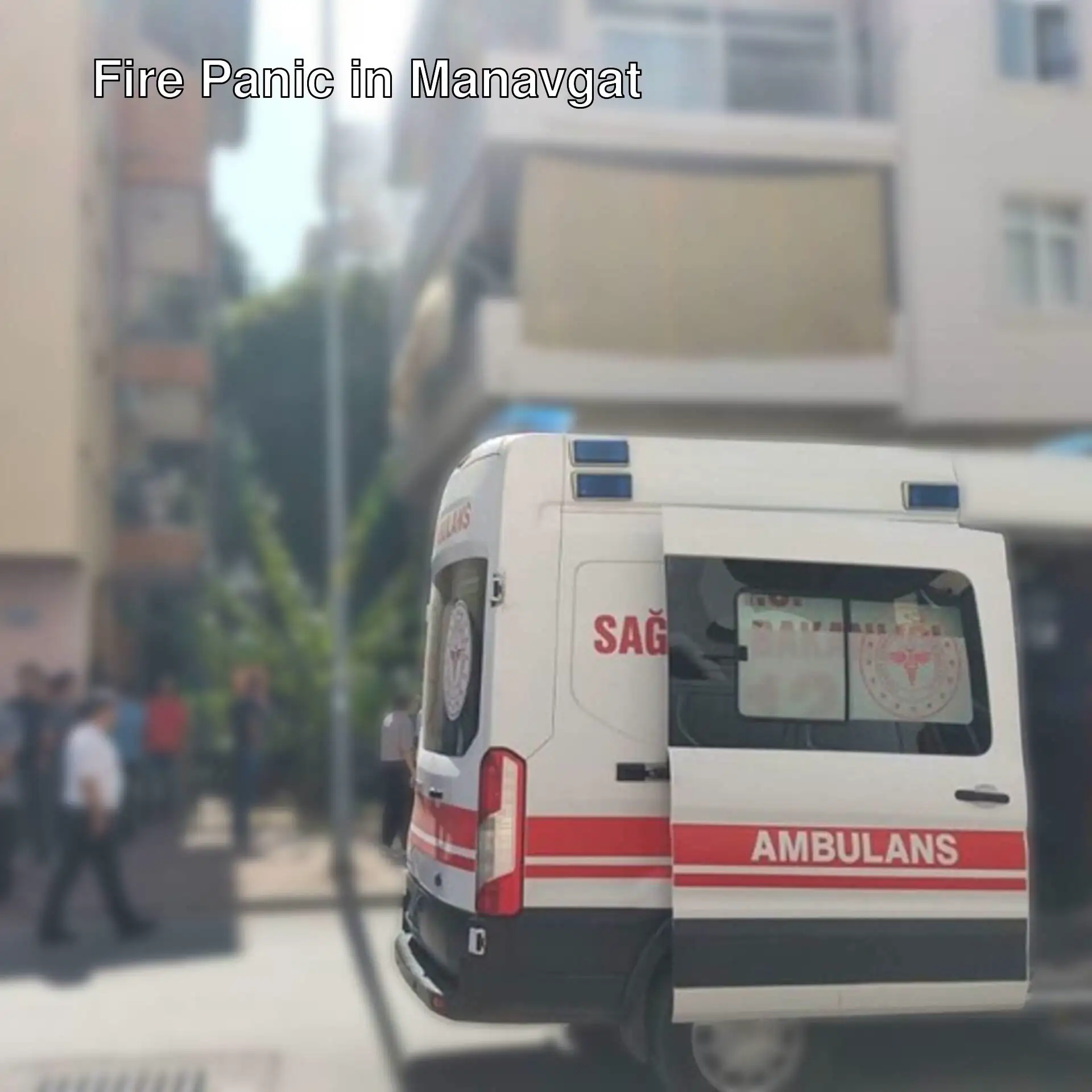 An ambulance parked on the side of a street.