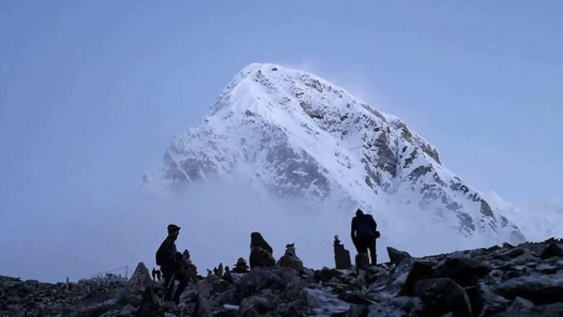Rescue teams working on the mountain.