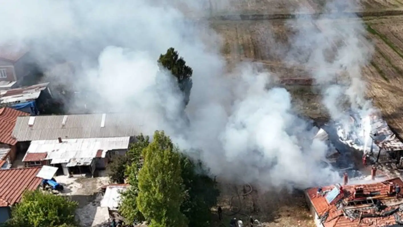 A house on fire with smoke coming out of it. A house on fire with smoke coming out of it.