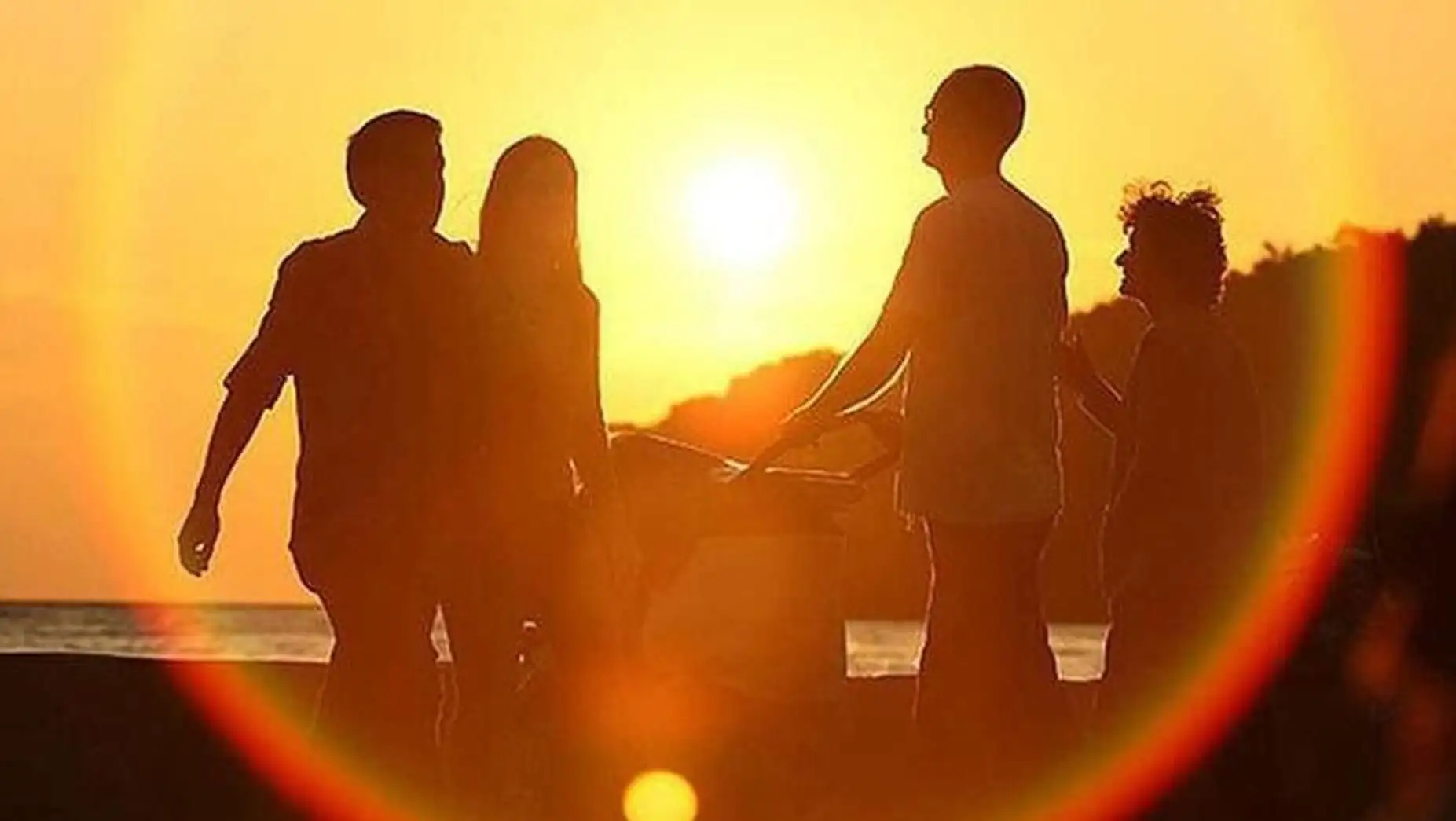 A group of people standing outside. A group of people standing outside.