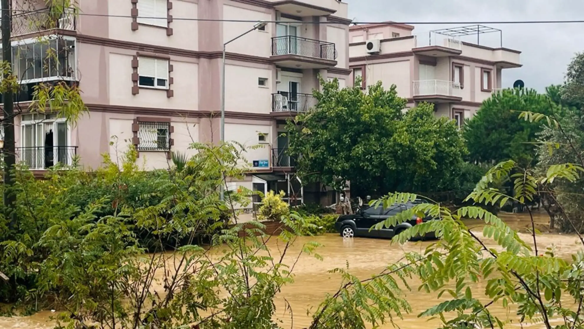 A car stranded in a flooded area. A car stranded in a flooded area.