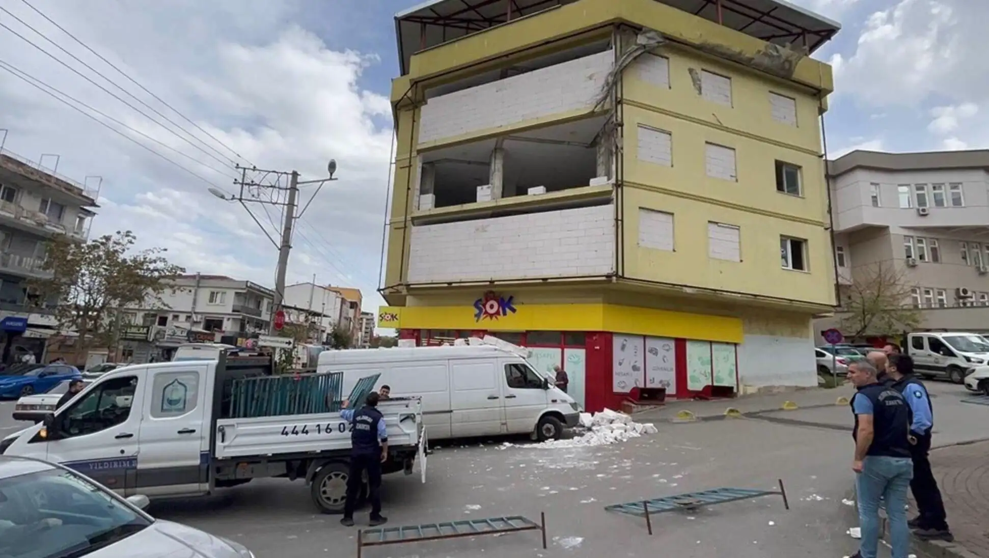 A building with broken windows. A building with broken windows.