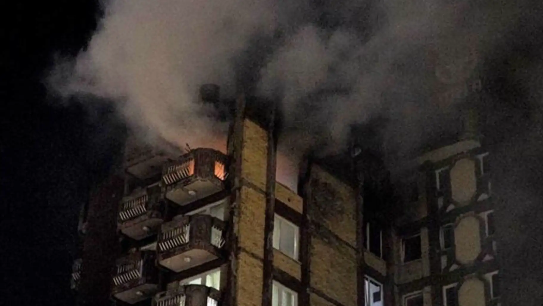 A building with smoke coming out of it. A building with smoke coming out of it.