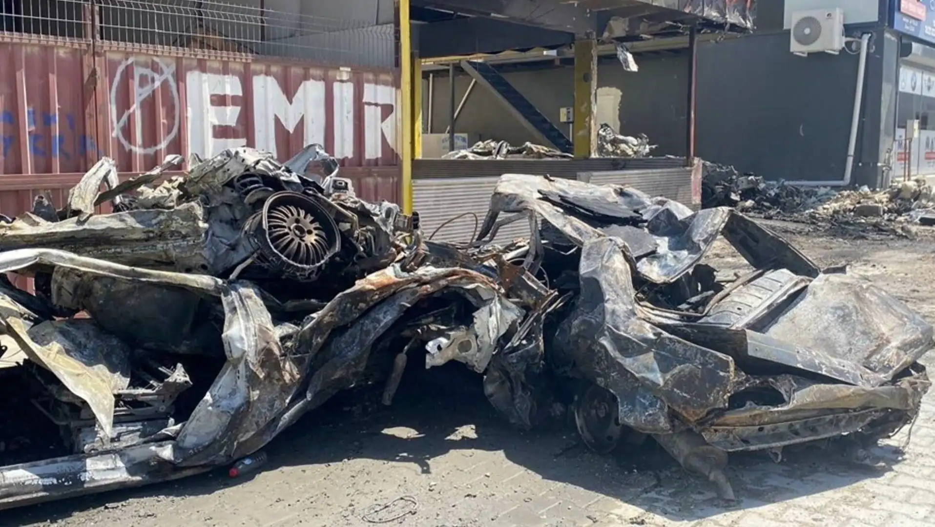 Damaged vehicles after the fire.