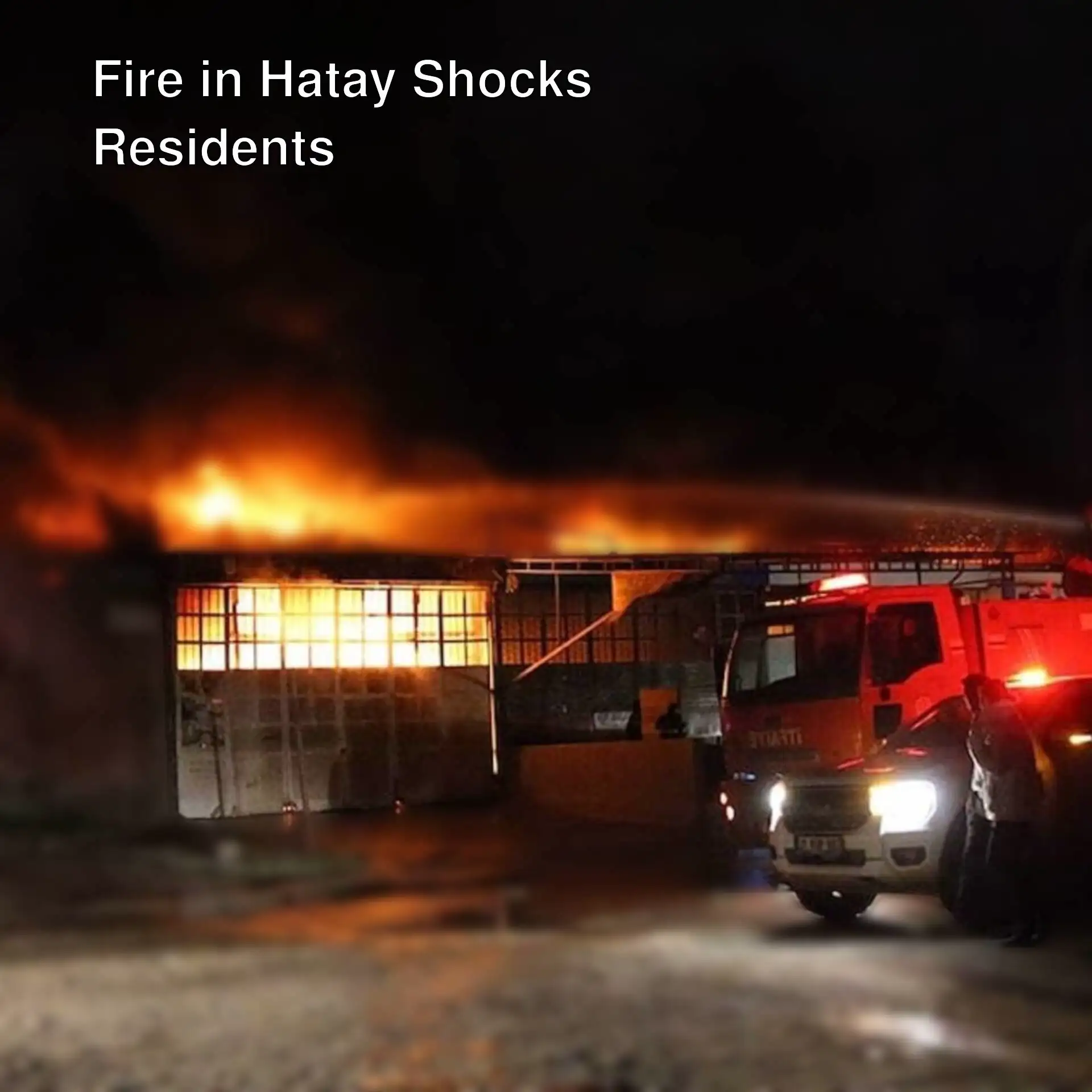 A fire on a building at night