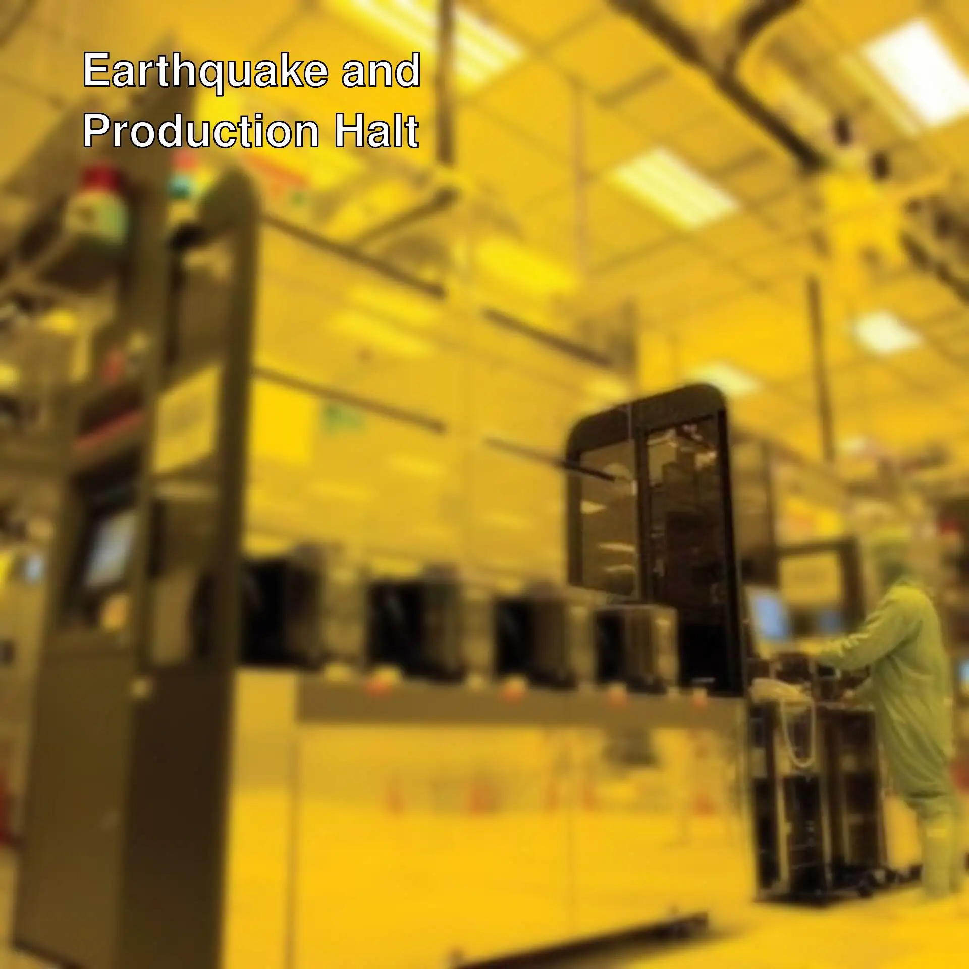 A man in a protective suit working in a factory.