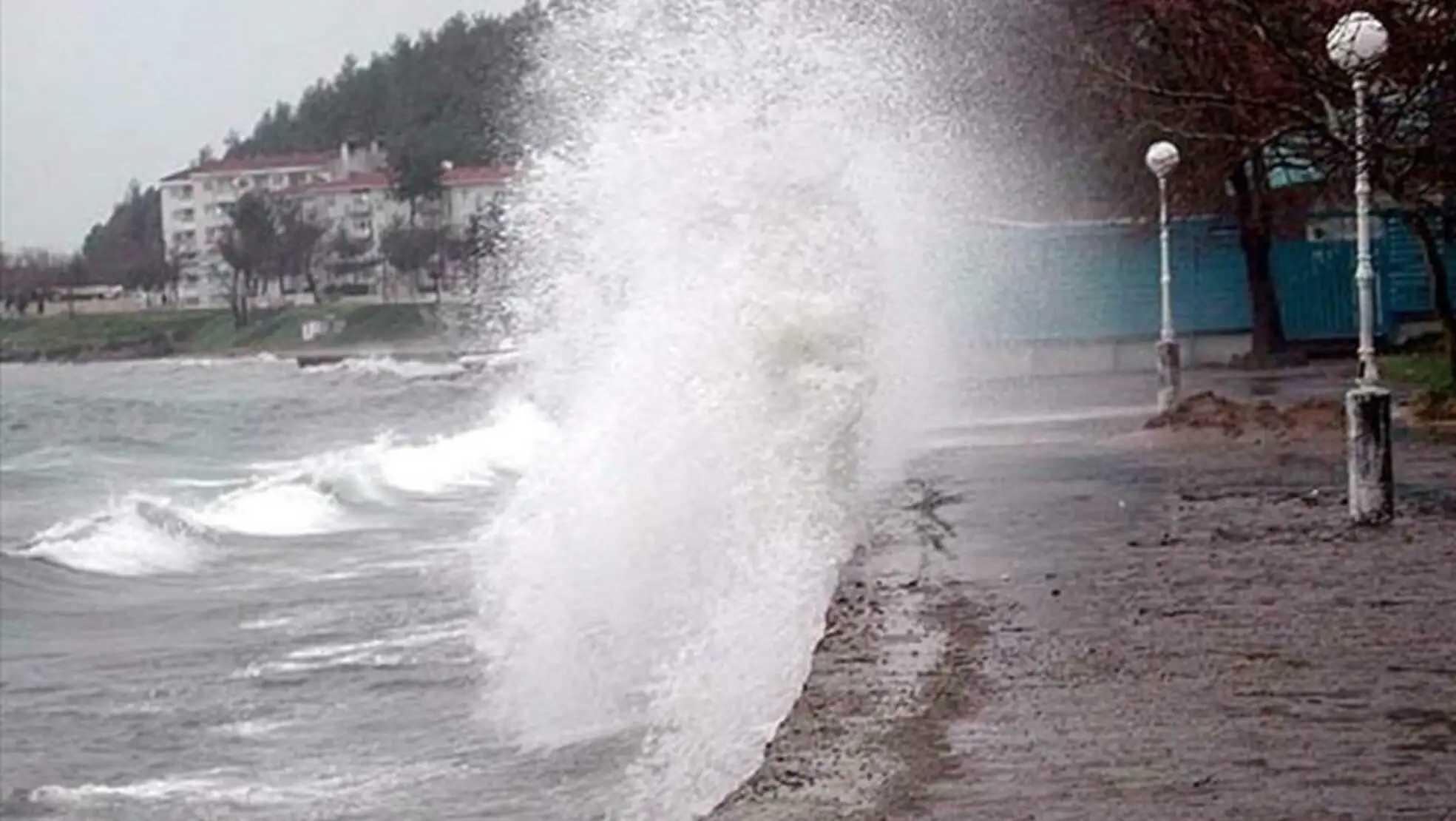 A wave crashing against a wall. A wave crashing against a wall.
