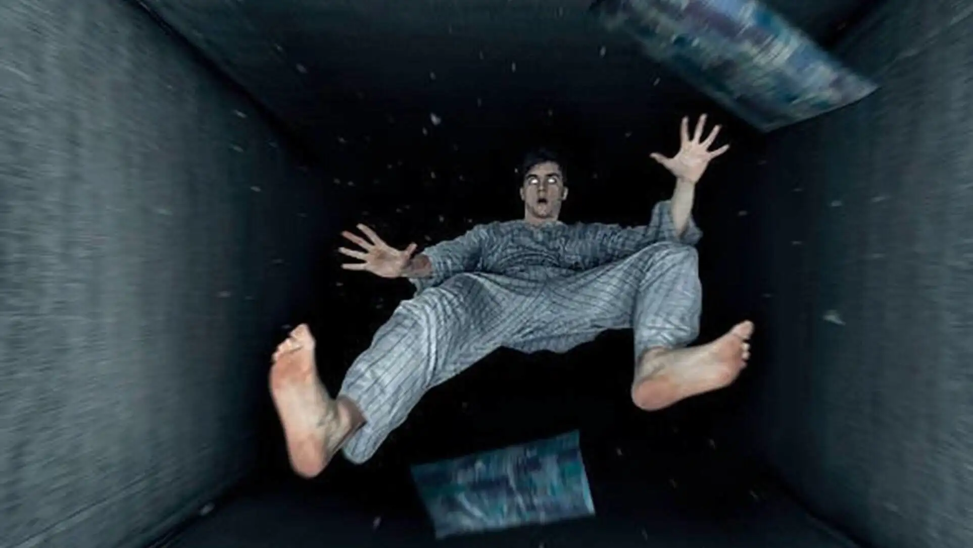 A man in a room with a box.