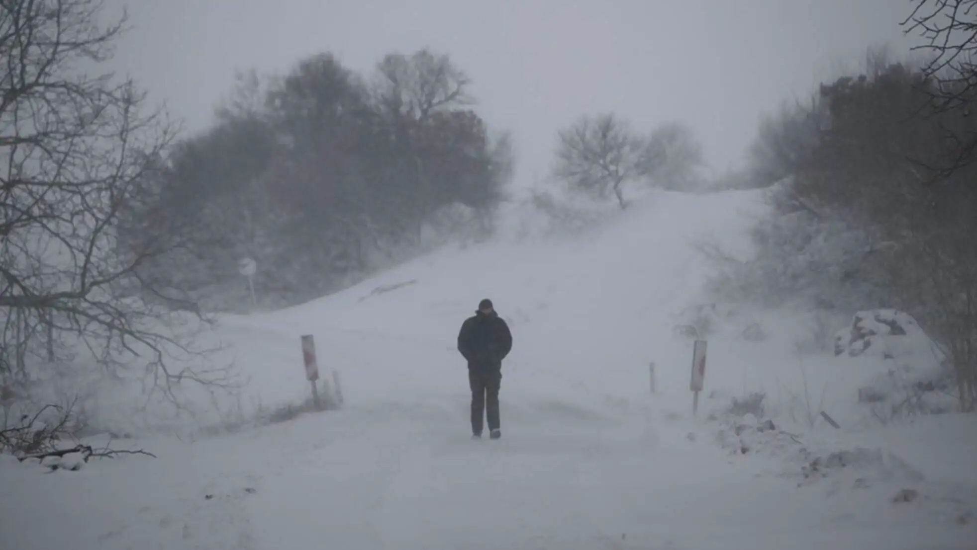 Due to freezing cold and snow, roads are closed. Vehicles are stranded. Due to freezing cold and snow, roads are closed. Vehicles are stranded.