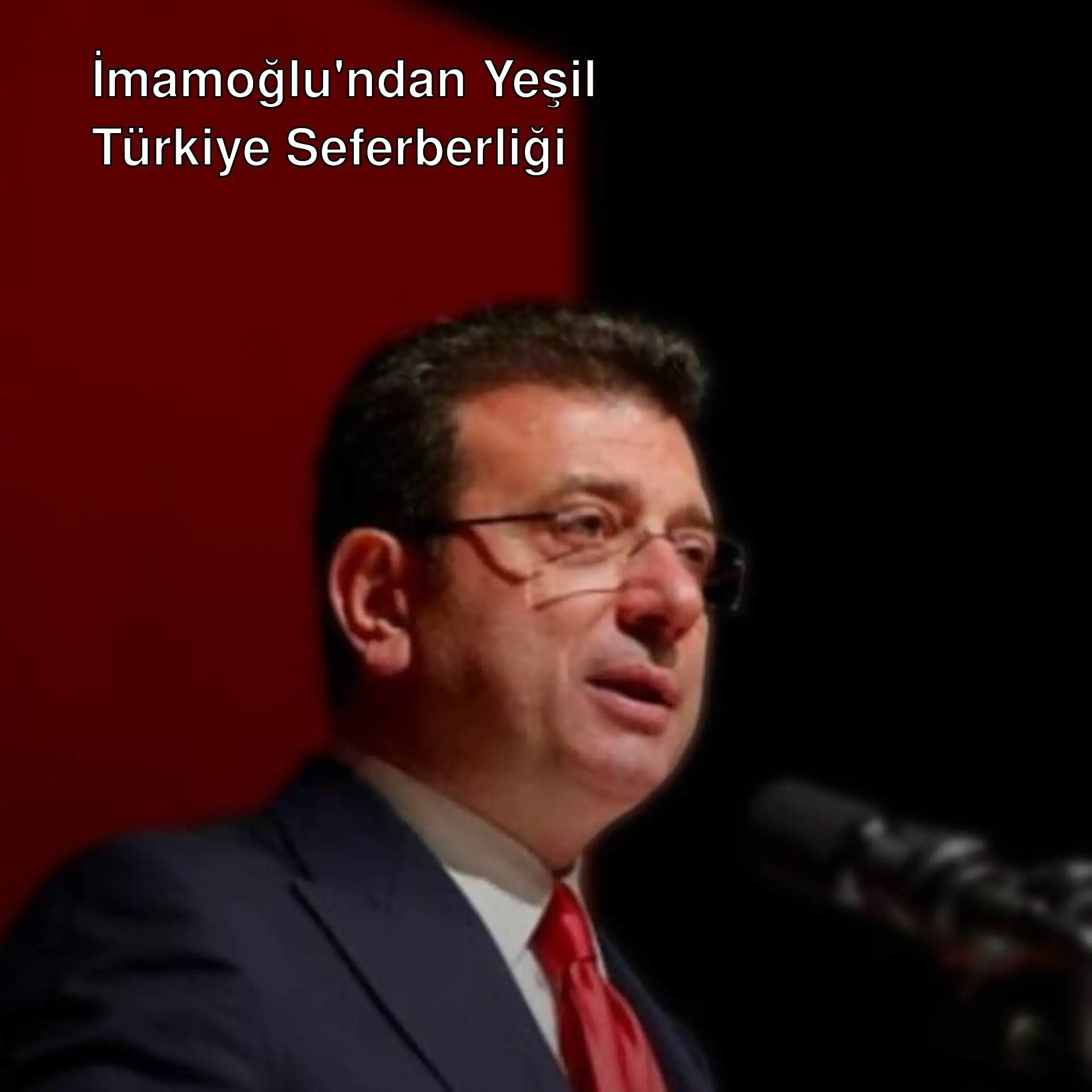 Ekrem İmamoğlu mikrofonla konuşuyor. Ekrem İmamoğlu mikrofonla konuşuyor.