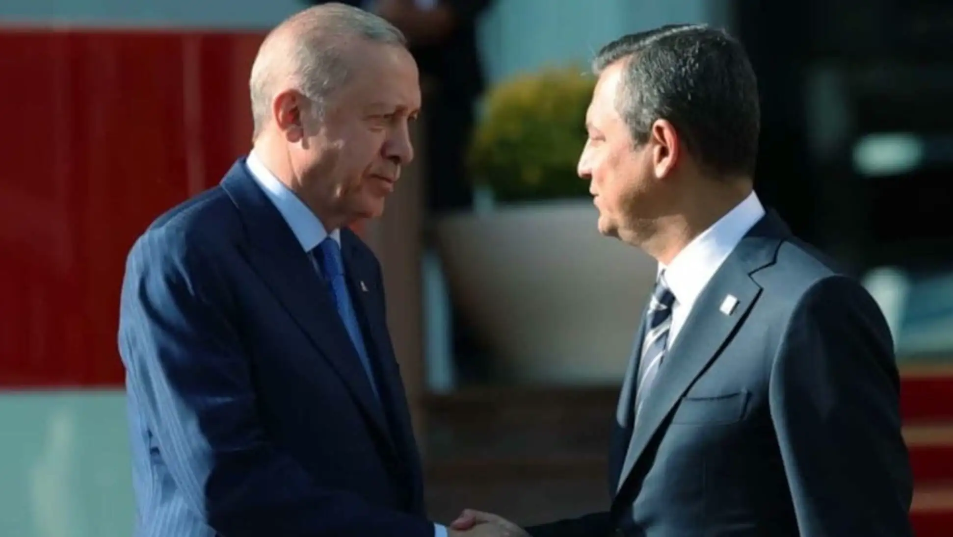 Two men shaking hands.