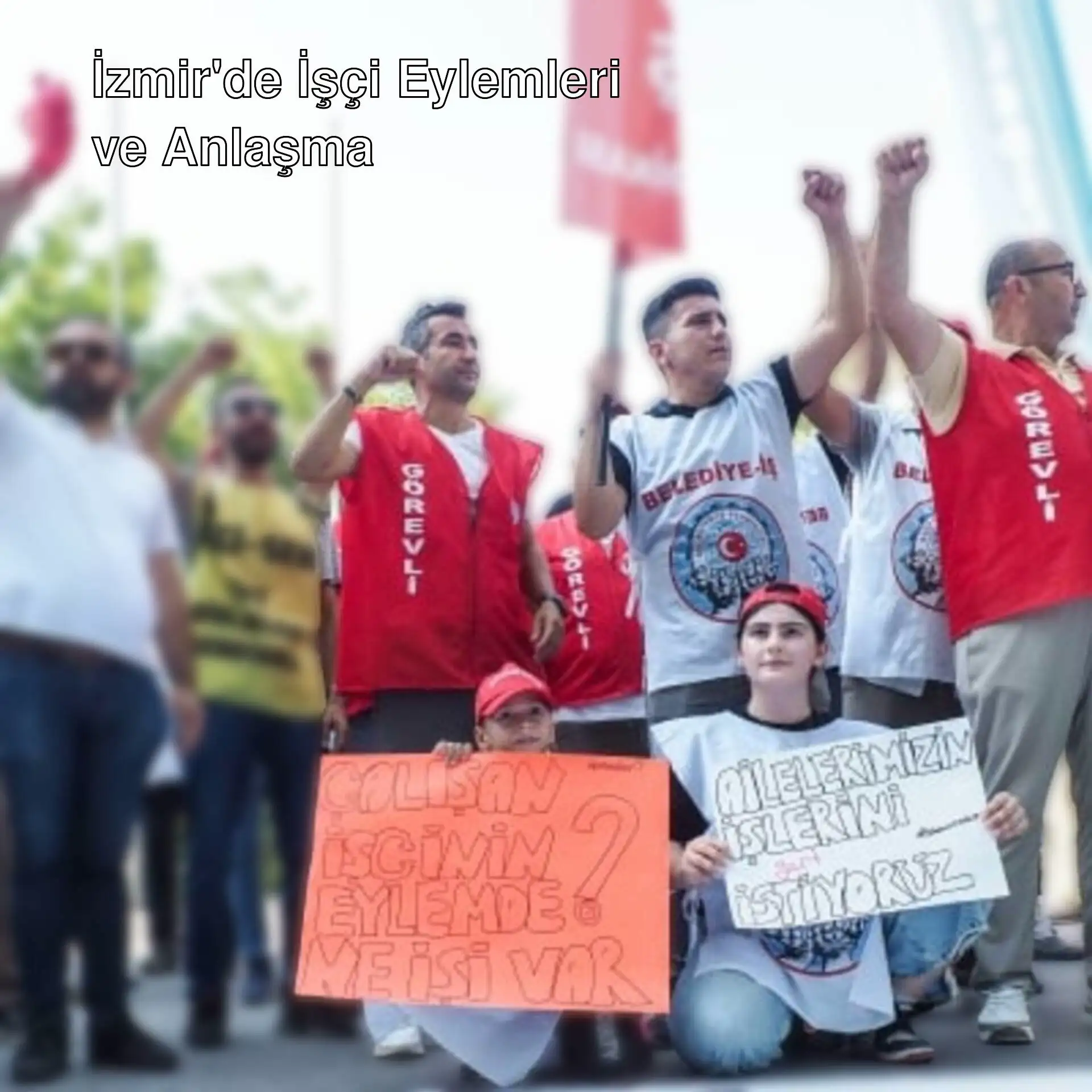 İzmir'de işçiler eylemde, pankartlar tutuyorlar. İzmir'de işçiler eylemde, pankartlar tutuyorlar.