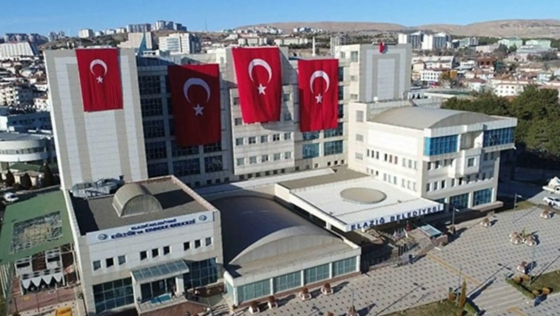 A building with flags on the side. A building with flags on the side.