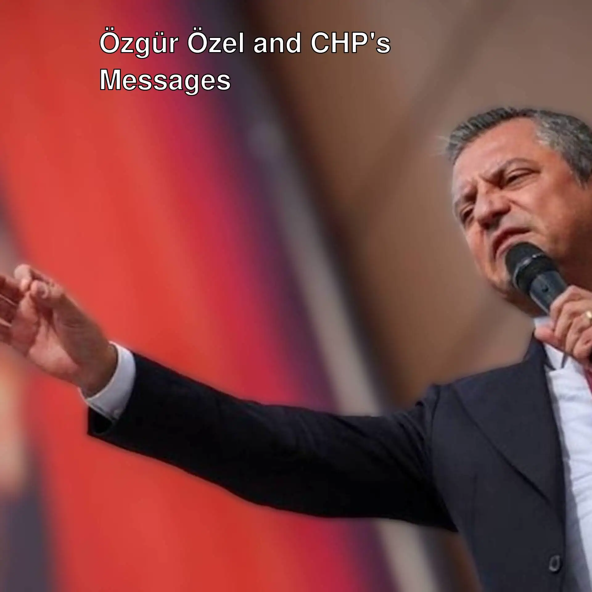 Özgür Özel holding a microphone