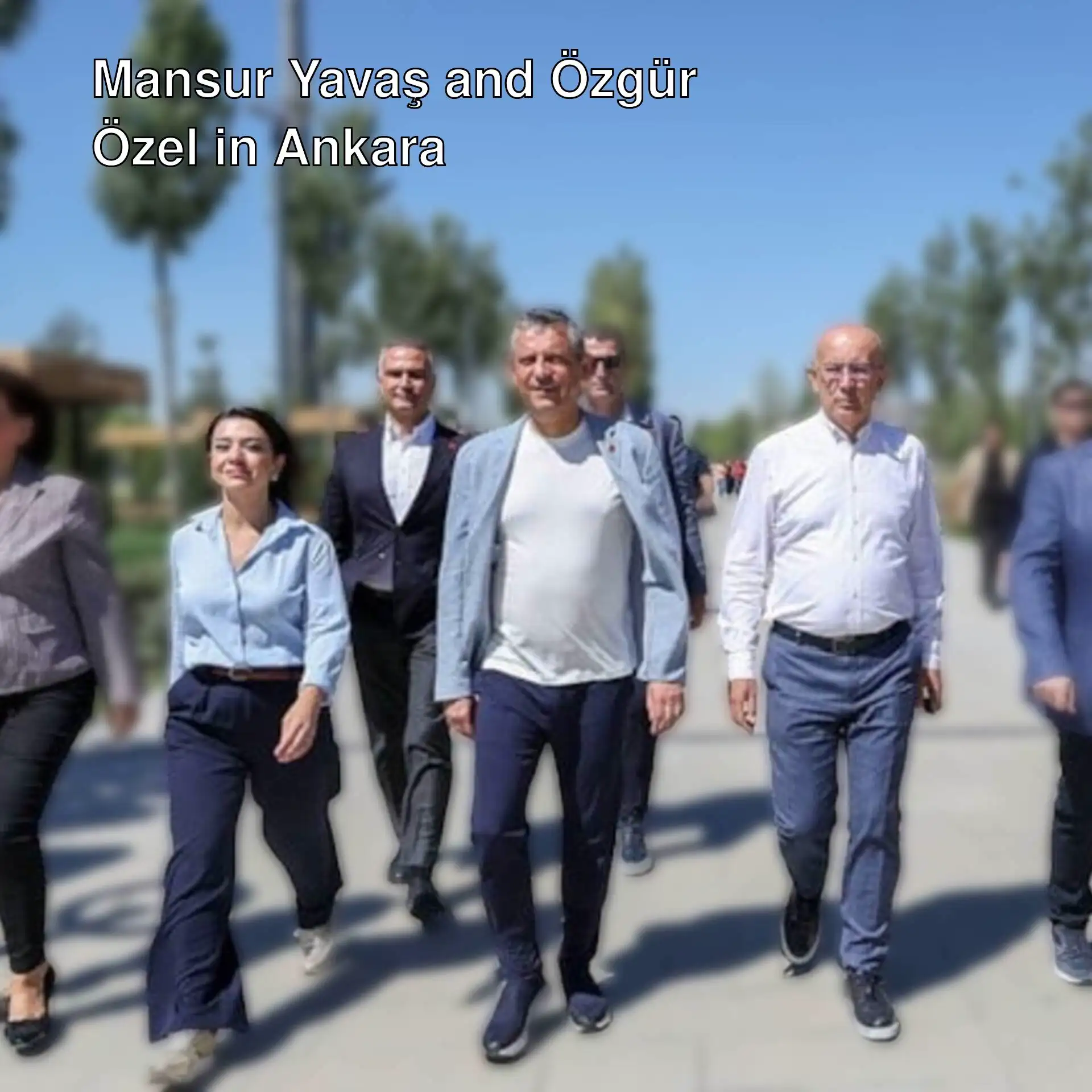 A group of people walking in Ankara. A group of people walking in Ankara.