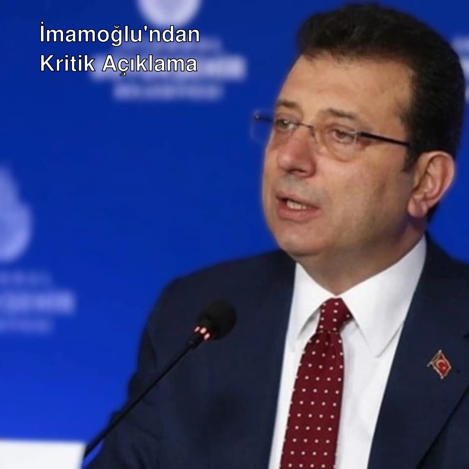 Ekrem İmamoğlu, resmi bir kıyafetle poz veriyor. Ekrem İmamoğlu, resmi bir kıyafetle poz veriyor.