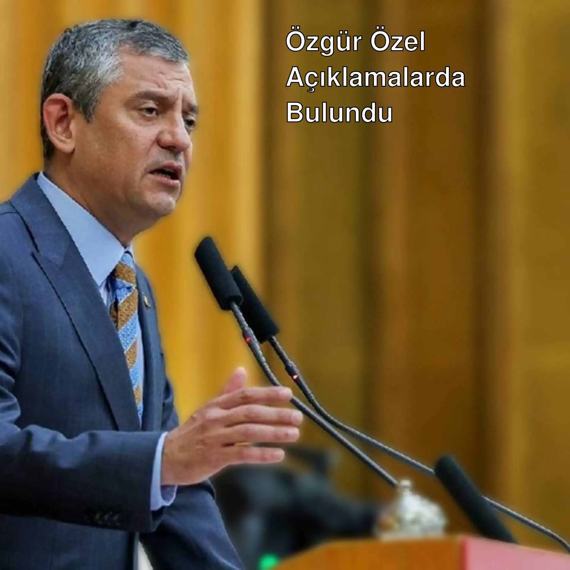 Özgür Özel, mikrofonla konuşma yapıyor. Özgür Özel, mikrofonla konuşma yapıyor.