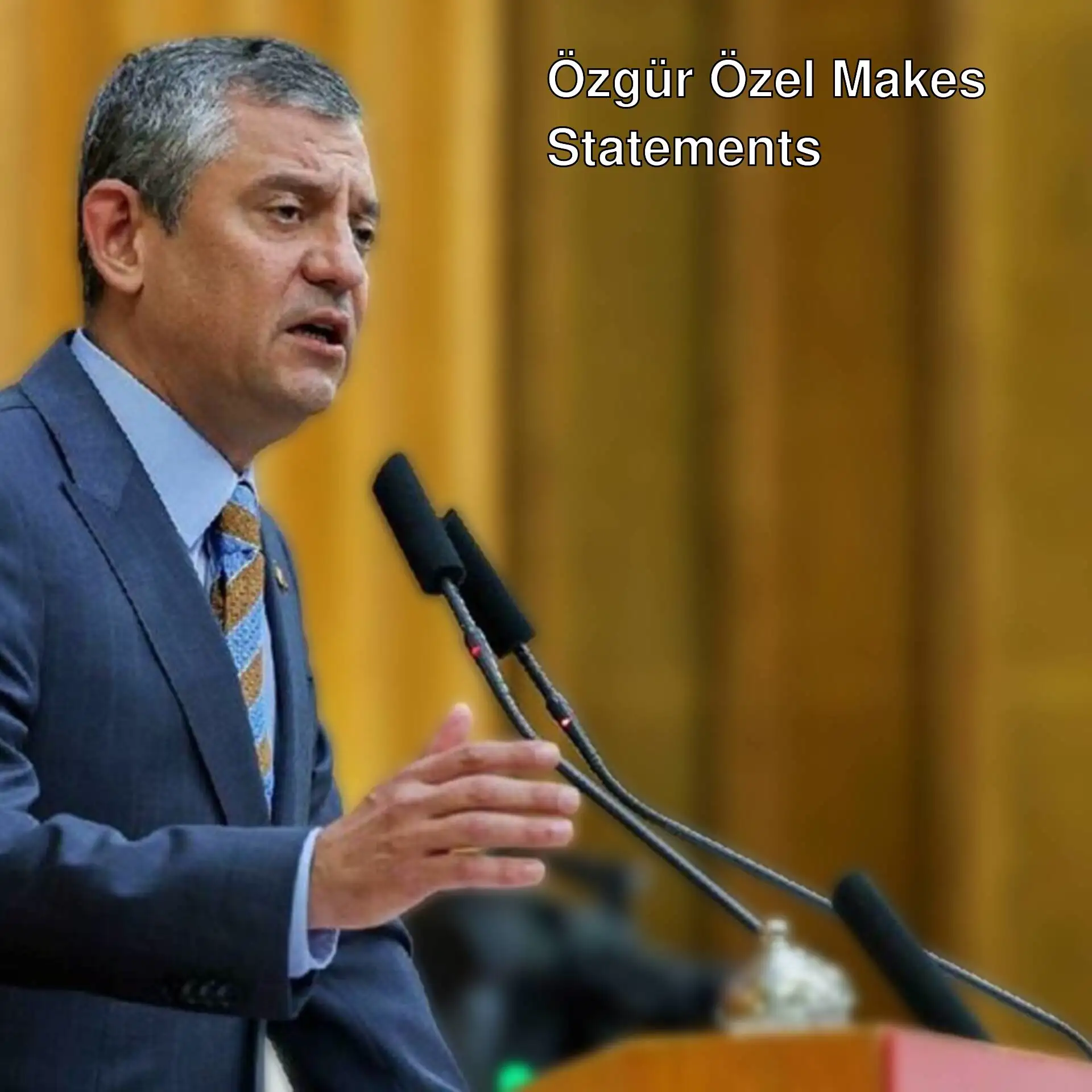 Özgür Özel speaking into a microphone.