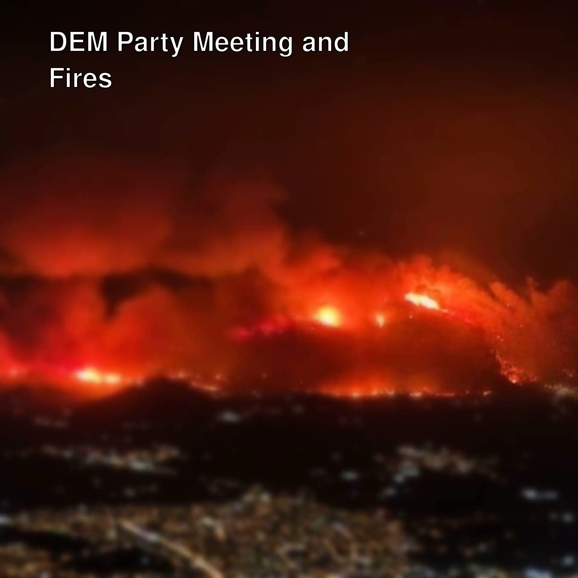 A fire in the mountains at night