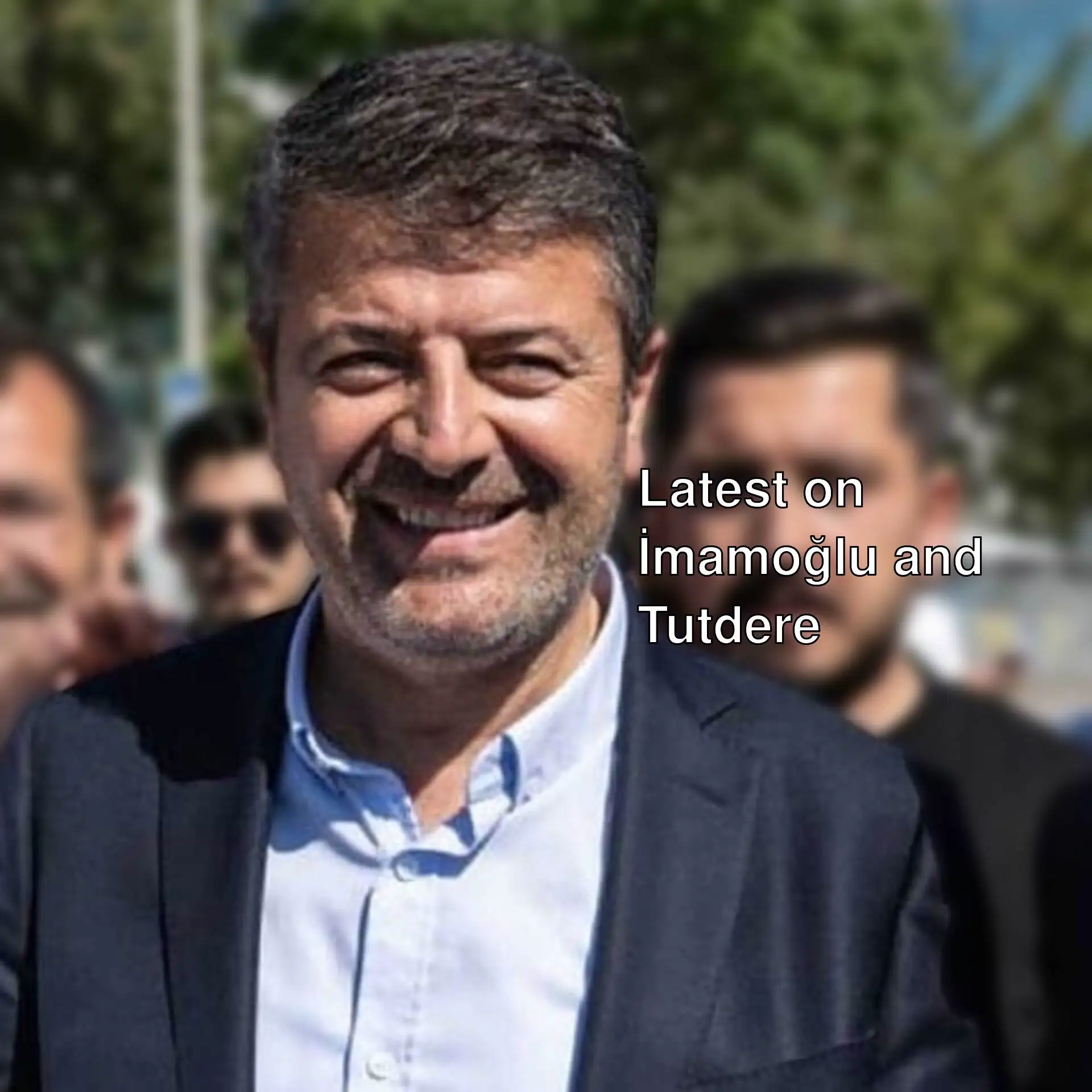 Abdurrahman Tutdere smiling for the camera.