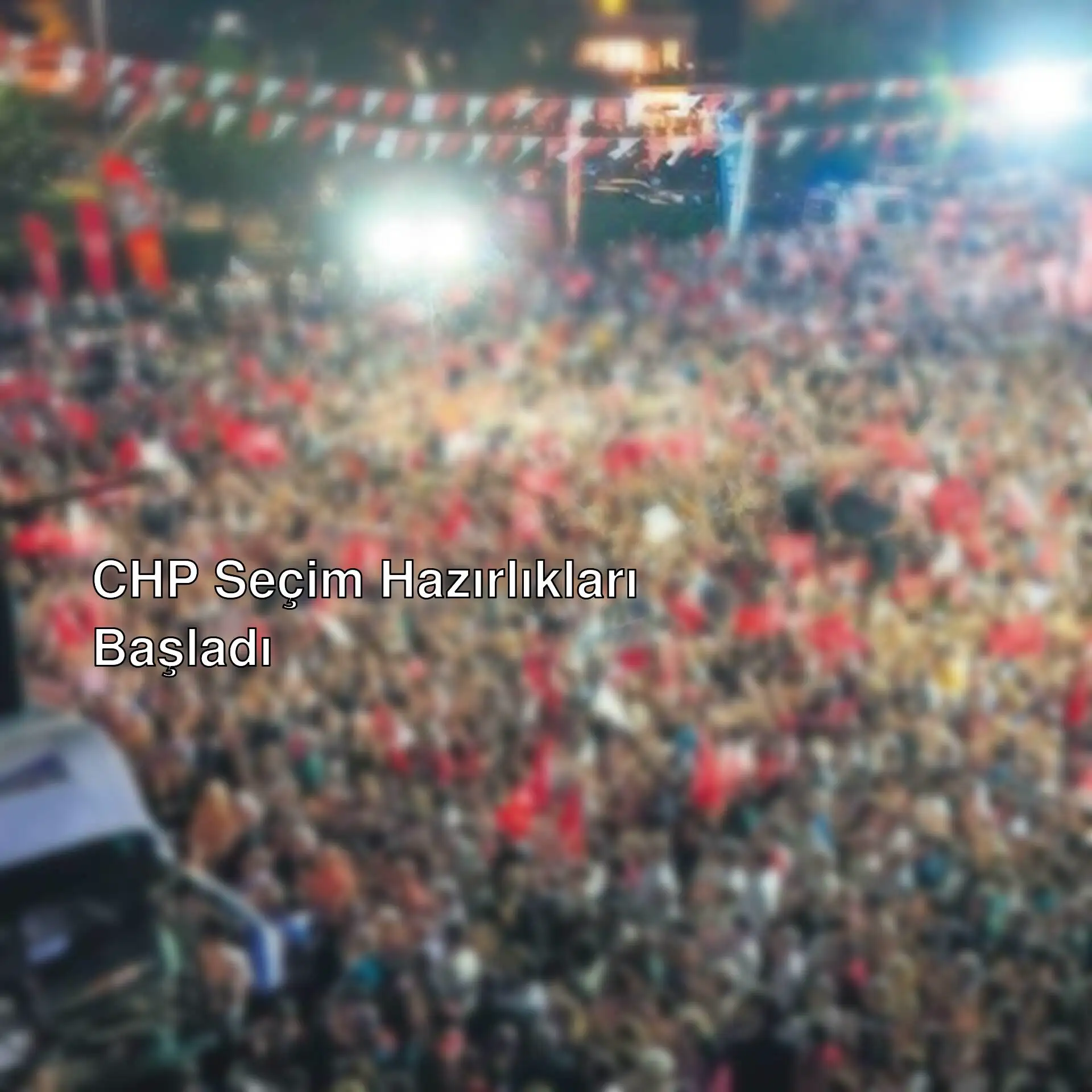 Büyük bir kalabalık, bayraklarla dolu.