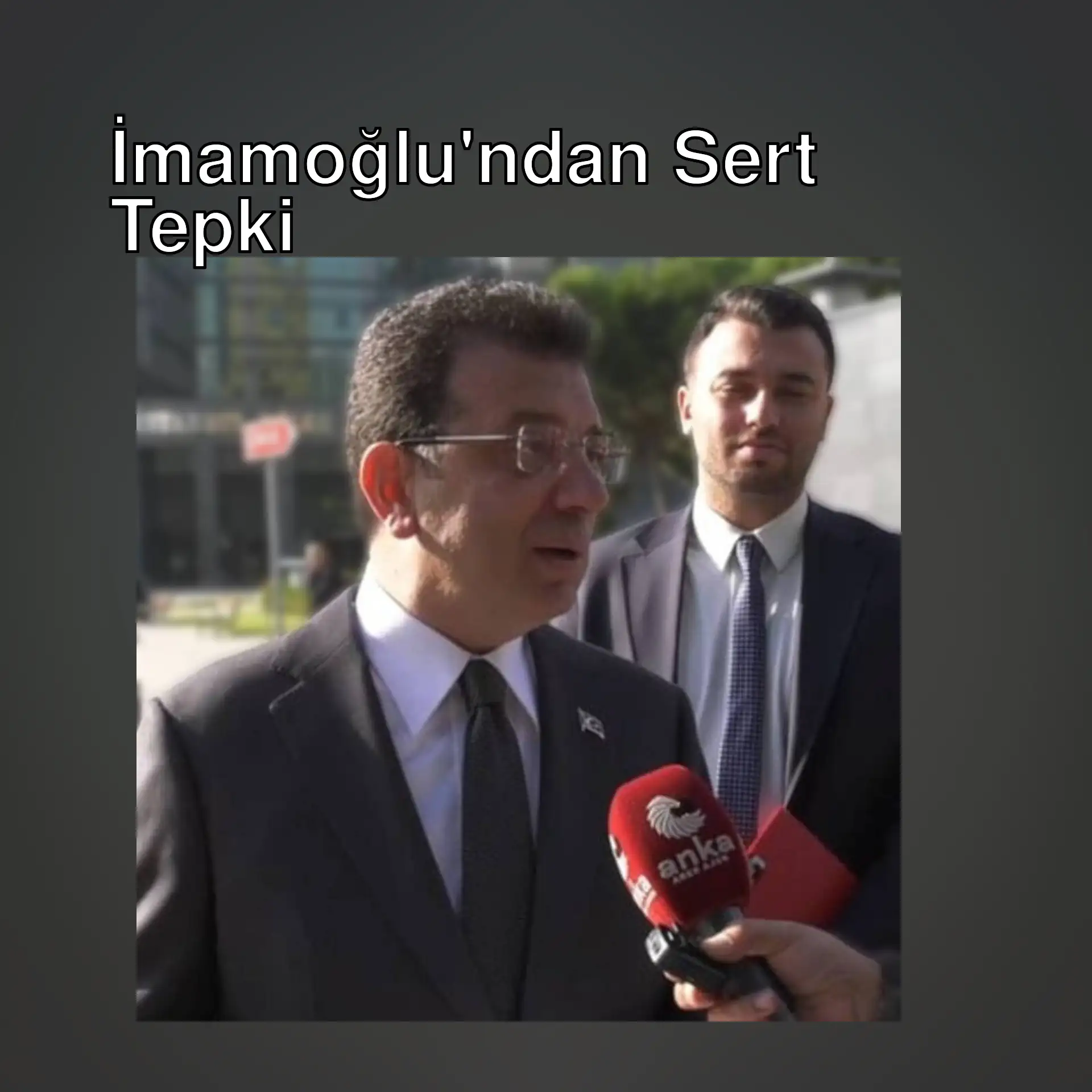 İmamoğlu, mikrofon tutarak konuşuyor. İmamoğlu, mikrofon tutarak konuşuyor.