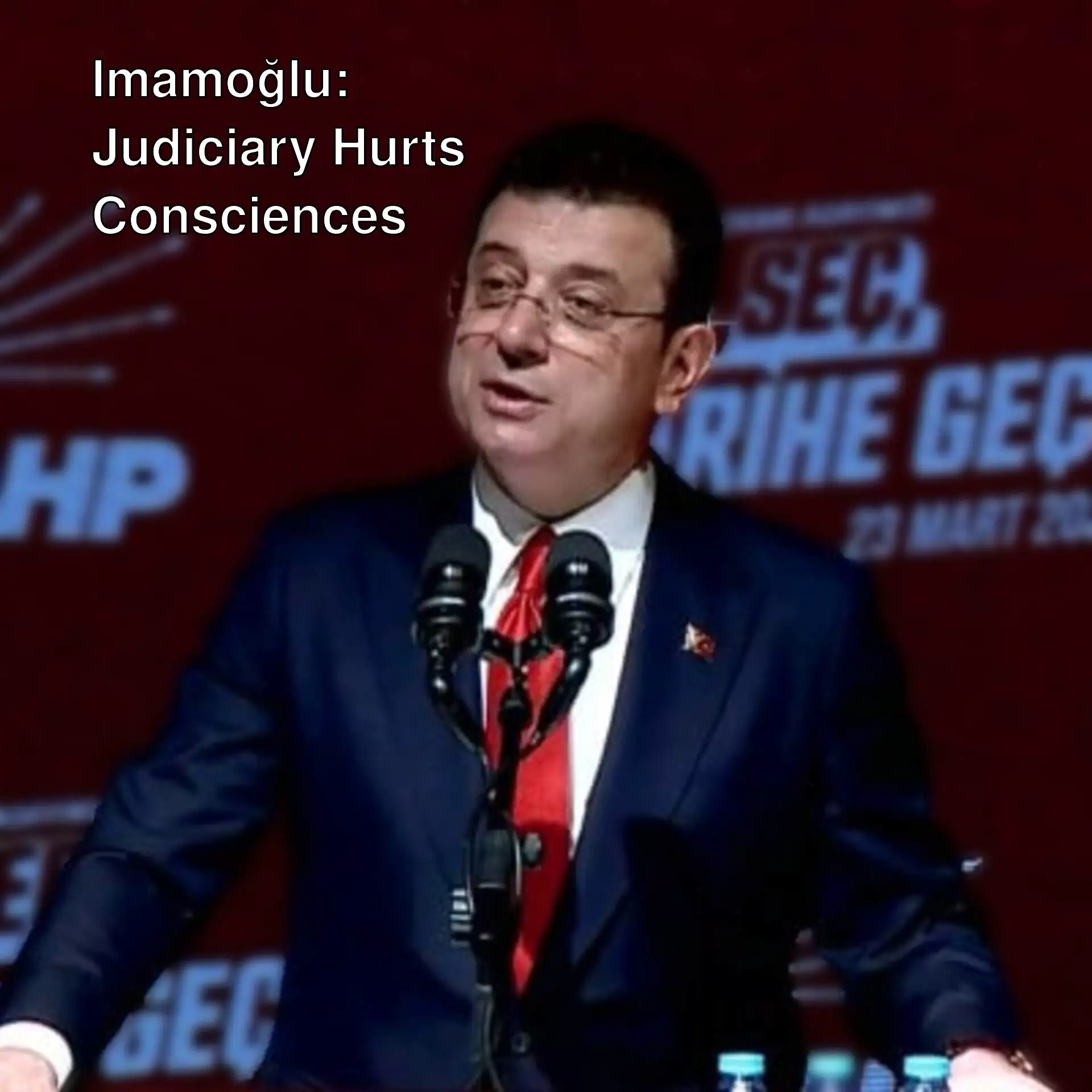 Ekrem İmamoğlu speaking at a press conference.